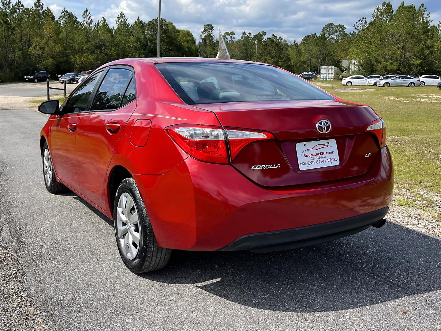 2014 Red Toyota Corolla L 4-Speed AT (2T1BURHE5EC) with an 1.8L L4 DOHC 16V engine, 4-Speed Automatic transmission, located at 18001 Kellogg Rd, Saucier, MS, 39574, (228) 832-1441, 139.421463, -76.641457 - ""GREAT PRICE!! "" 2014 TOYOTA COROLLA LE All you need is proof of income, proof of residence, valid drivers license and insurance! No credit check ever!! Only $995 DN - or buy it outright for $8,395. – TOYOTA Strong! - 1.8L DOHC 16V – Runs GREAT - Just Serviced! – CARFAX Great Value! - Photo#4