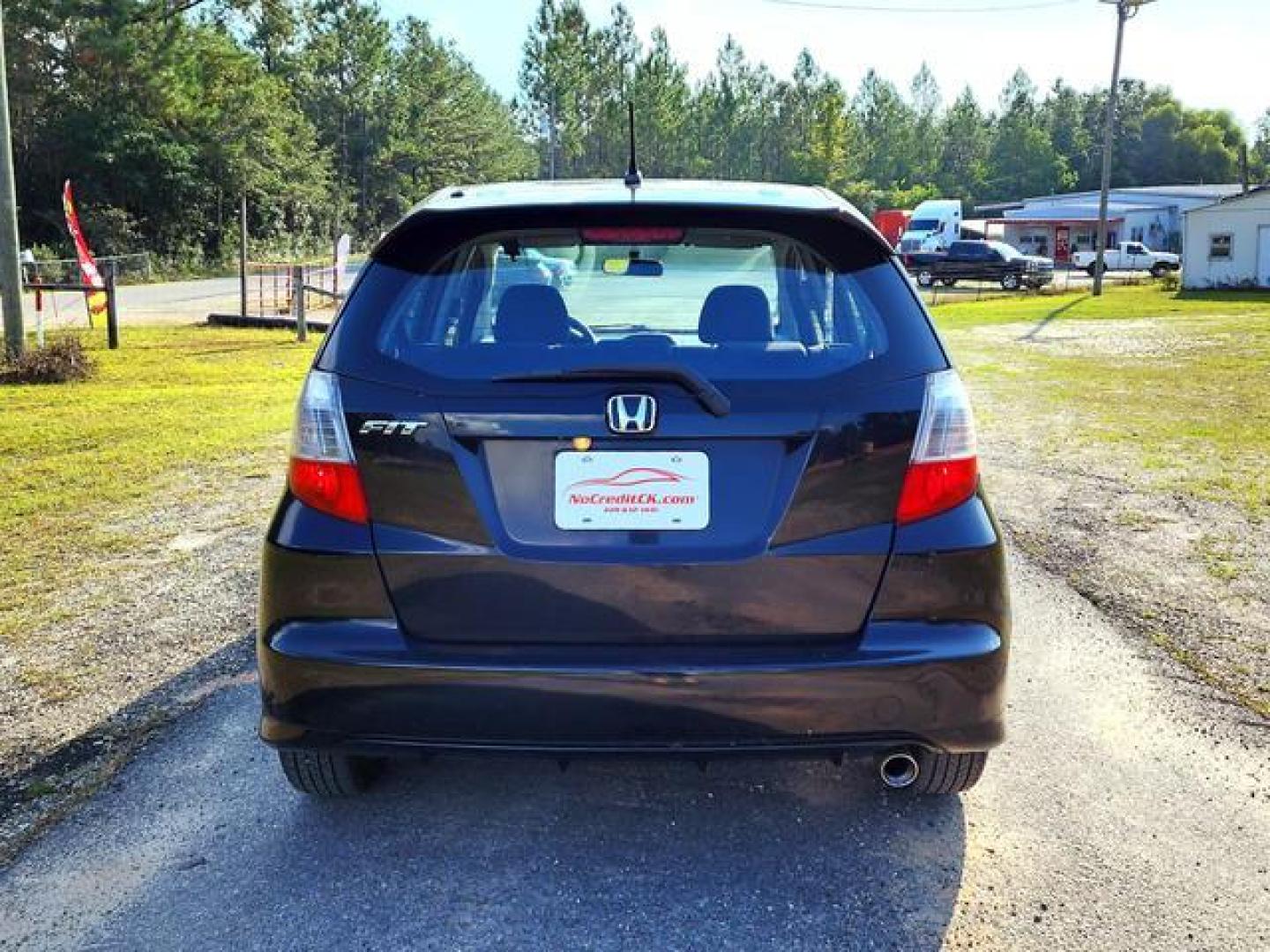 2010 Black /Gray Honda Fit Sport Hatchback 4D (JHMGE8H41AC) with an 1.5L L4 SOHC 16V engine, Automatic, 5-Spd w/Overdrive transmission, located at 18001 Kellogg Rd, Saucier, MS, 39574, (228) 832-1441, 139.421463, -76.641457 - '' E-Z FINANCING!! '' 2010 Honda Fit Sport Hatchback 4D ~ 2-Owners, 33 MPG, Great Value, CARFAX APPROVED, LOW DOWN PAYMENT, SKIP YOUR FIRST PAYMENT, IRON CLAD Warranty, AND MUCH MORE !!We have ALL TYPES OF FINANCING OPTIONS! This Books out for $5,570 - Buy it today for only $4,895 !! Easy easy appro - Photo#6