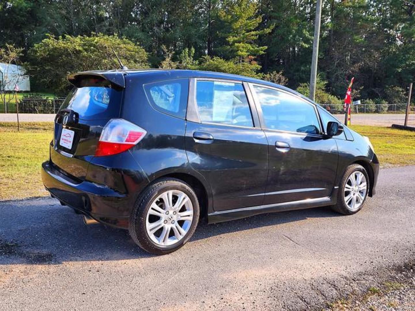 2010 Black /Gray Honda Fit Sport Hatchback 4D (JHMGE8H41AC) with an 1.5L L4 SOHC 16V engine, Automatic, 5-Spd w/Overdrive transmission, located at 18001 Kellogg Rd, Saucier, MS, 39574, (228) 832-1441, 139.421463, -76.641457 - '' E-Z FINANCING!! '' 2010 Honda Fit Sport Hatchback 4D ~ 2-Owners, 33 MPG, Great Value, CARFAX APPROVED, LOW DOWN PAYMENT, SKIP YOUR FIRST PAYMENT, IRON CLAD Warranty, AND MUCH MORE !!We have ALL TYPES OF FINANCING OPTIONS! This Books out for $5,570 - Buy it today for only $4,895 !! Easy easy appro - Photo#7