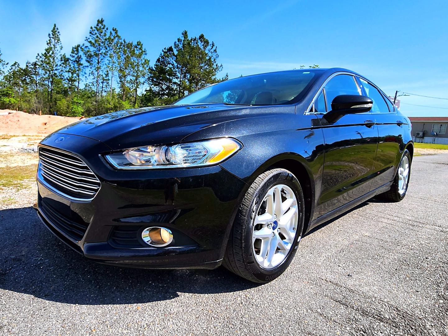 2013 Black Ford Fusion SE (3FA6P0HR3DR) with an 1.6L L4 DOHC 16V engine, Automatic transmission, located at 18001 Kellogg Rd, Saucier, MS, 39574, (228) 832-1441, 139.421463, -76.641457 - Photo#16