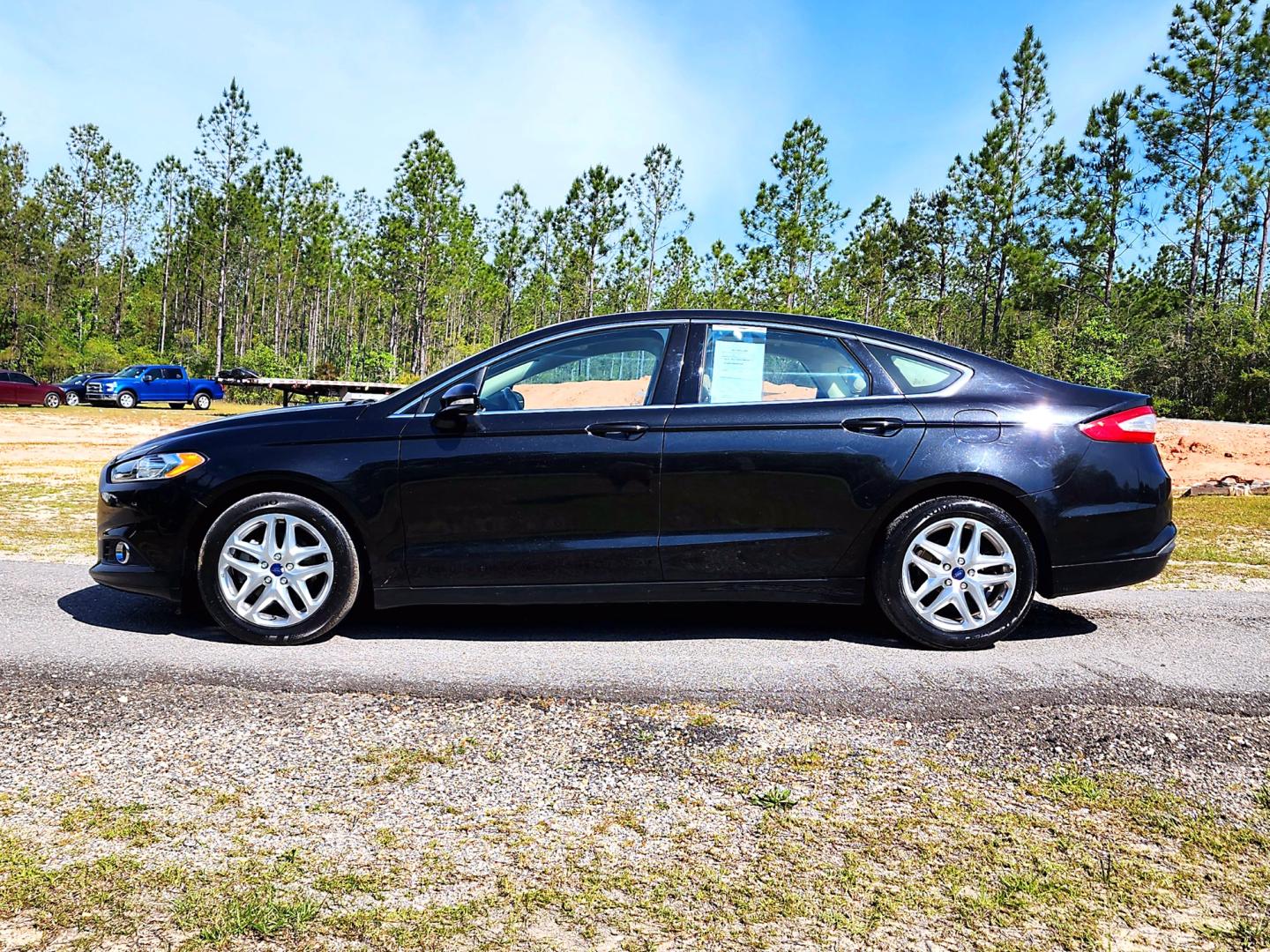 2013 Black Ford Fusion SE (3FA6P0HR3DR) with an 1.6L L4 DOHC 16V engine, Automatic transmission, located at 18001 Kellogg Rd, Saucier, MS, 39574, (228) 832-1441, 139.421463, -76.641457 - Photo#4