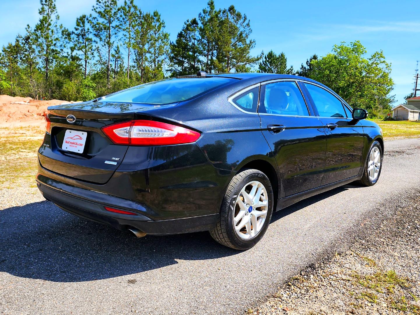 2013 Black Ford Fusion SE (3FA6P0HR3DR) with an 1.6L L4 DOHC 16V engine, Automatic transmission, located at 18001 Kellogg Rd, Saucier, MS, 39574, (228) 832-1441, 139.421463, -76.641457 - Photo#5