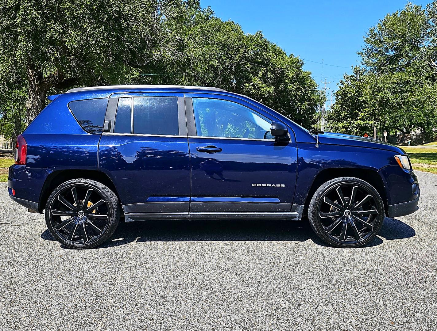 2014 Blue Jeep Compass Sport FWD (1C4NJCBA5ED) with an 2.0L L4 DOHC 16V engine, AUTOMATIC transmission, located at 18001 Kellogg Rd, Saucier, MS, 39574, (228) 832-1441, 39.421459, -76.641457 - CLEAN CARFAX !! 2014 JEEP COMPASS SPORT – JEEP Strong! - 2.0L DOHC 16V – Runs GREAT - Just Serviced! – CLEAN CARFAX Vehicle! – FUEL SAVER!! est. 30 MPG hwy! – AUTOMATIC Transmission – Ice COLD A/C – Aftermarket -AM // FM // XM // CD // USB // MP3 // BLUETOOTH Stereo  - Photo#3