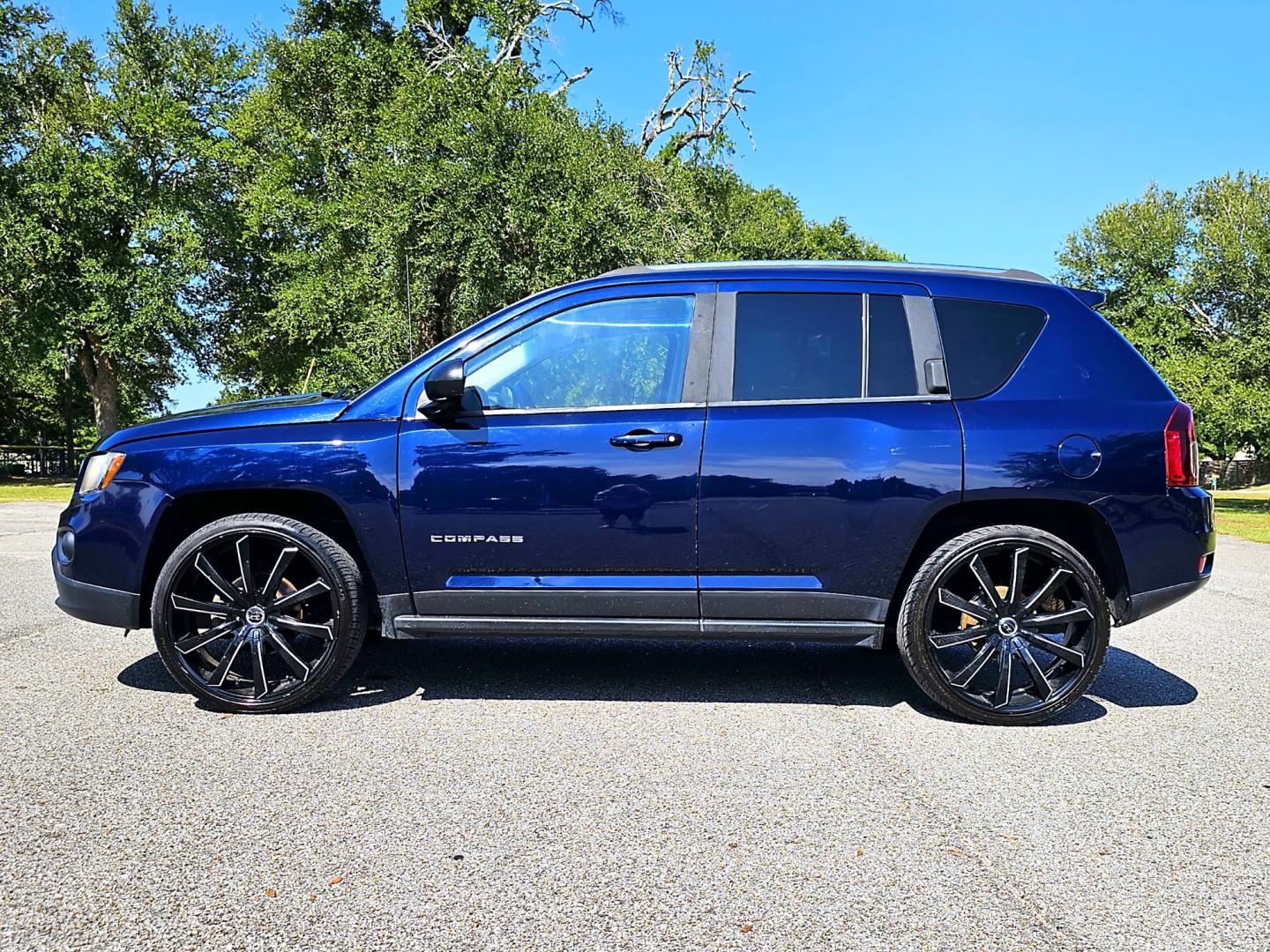 2014 Blue Jeep Compass Sport FWD (1C4NJCBA5ED) with an 2.0L L4 DOHC 16V engine, AUTOMATIC transmission, located at 18001 Kellogg Rd, Saucier, MS, 39574, (228) 832-1441, 39.421459, -76.641457 - CLEAN CARFAX !! 2014 JEEP COMPASS SPORT – JEEP Strong! - 2.0L DOHC 16V – Runs GREAT - Just Serviced! – CLEAN CARFAX Vehicle! – FUEL SAVER!! est. 30 MPG hwy! – AUTOMATIC Transmission – Ice COLD A/C – Aftermarket -AM // FM // XM // CD // USB // MP3 // BLUETOOTH Stereo  - Photo#4