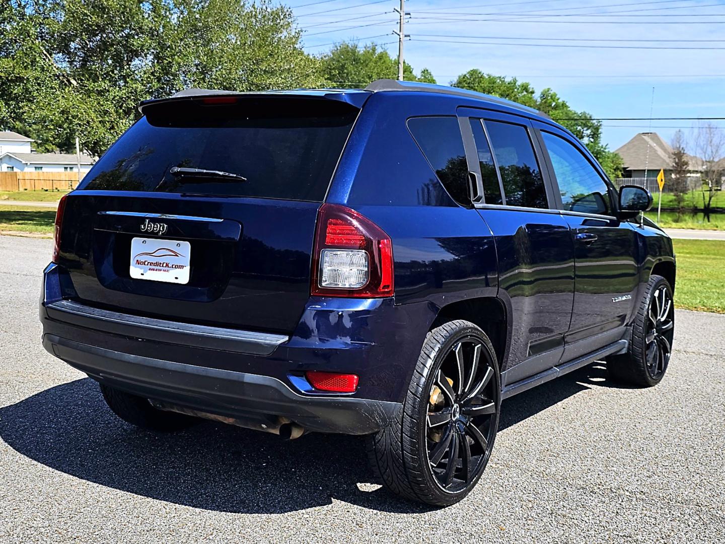 2014 Blue Jeep Compass Sport FWD (1C4NJCBA5ED) with an 2.0L L4 DOHC 16V engine, AUTOMATIC transmission, located at 18001 Kellogg Rd, Saucier, MS, 39574, (228) 832-1441, 39.421459, -76.641457 - CLEAN CARFAX !! 2014 JEEP COMPASS SPORT – JEEP Strong! - 2.0L DOHC 16V – Runs GREAT - Just Serviced! – CLEAN CARFAX Vehicle! – FUEL SAVER!! est. 30 MPG hwy! – AUTOMATIC Transmission – Ice COLD A/C – Aftermarket -AM // FM // XM // CD // USB // MP3 // BLUETOOTH Stereo  - Photo#5