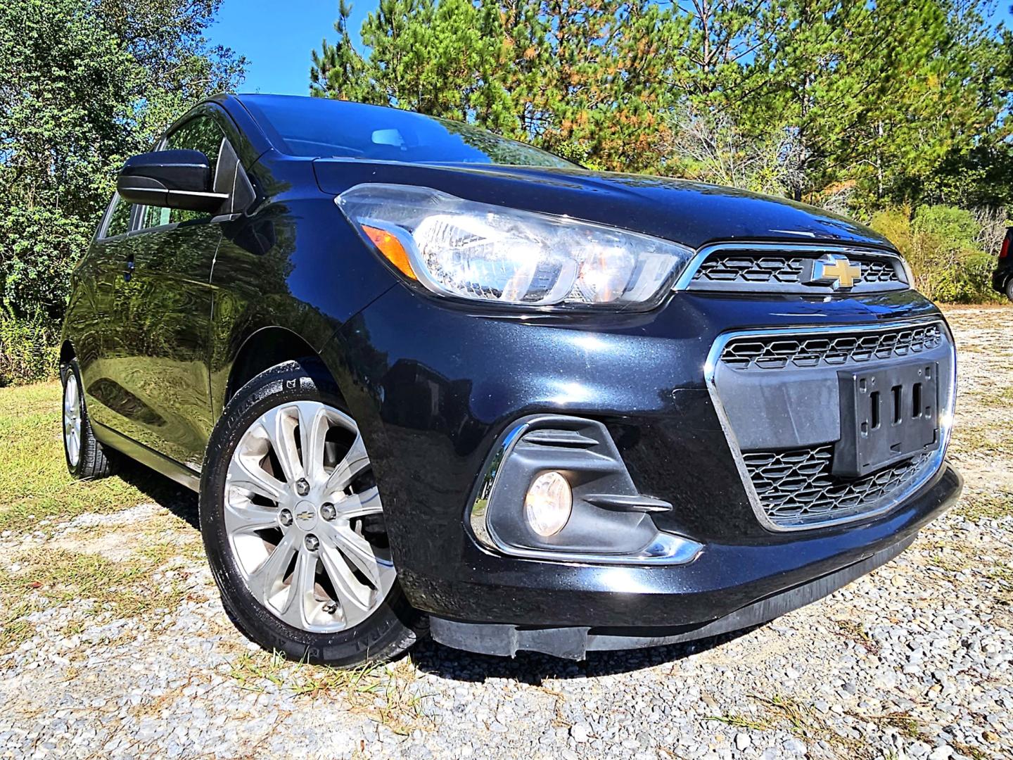 2016 Black Chevrolet Spark 1LT CVT (KL8CD6SA1GC) with an 1.4L L4 16V DOHC engine, CVT transmission, located at 18001 Kellogg Rd, Saucier, MS, 39574, (228) 832-1441, 139.421463, -76.641457 - Photo#2