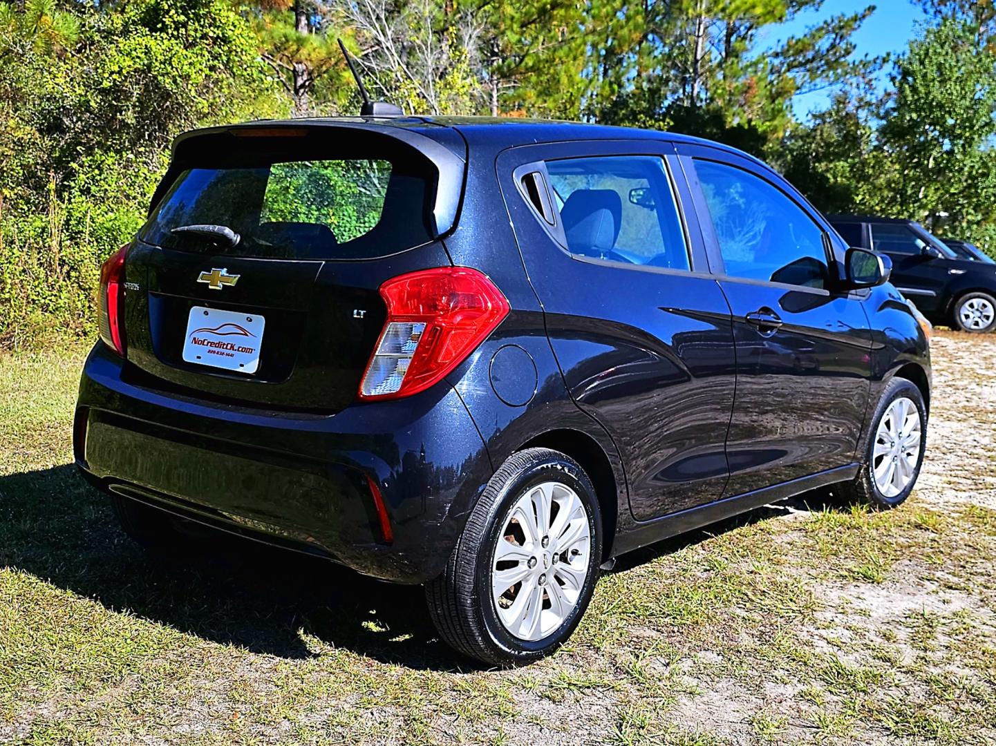 2016 Black Chevrolet Spark 1LT CVT (KL8CD6SA1GC) with an 1.4L L4 16V DOHC engine, CVT transmission, located at 18001 Kellogg Rd, Saucier, MS, 39574, (228) 832-1441, 139.421463, -76.641457 - Photo#5