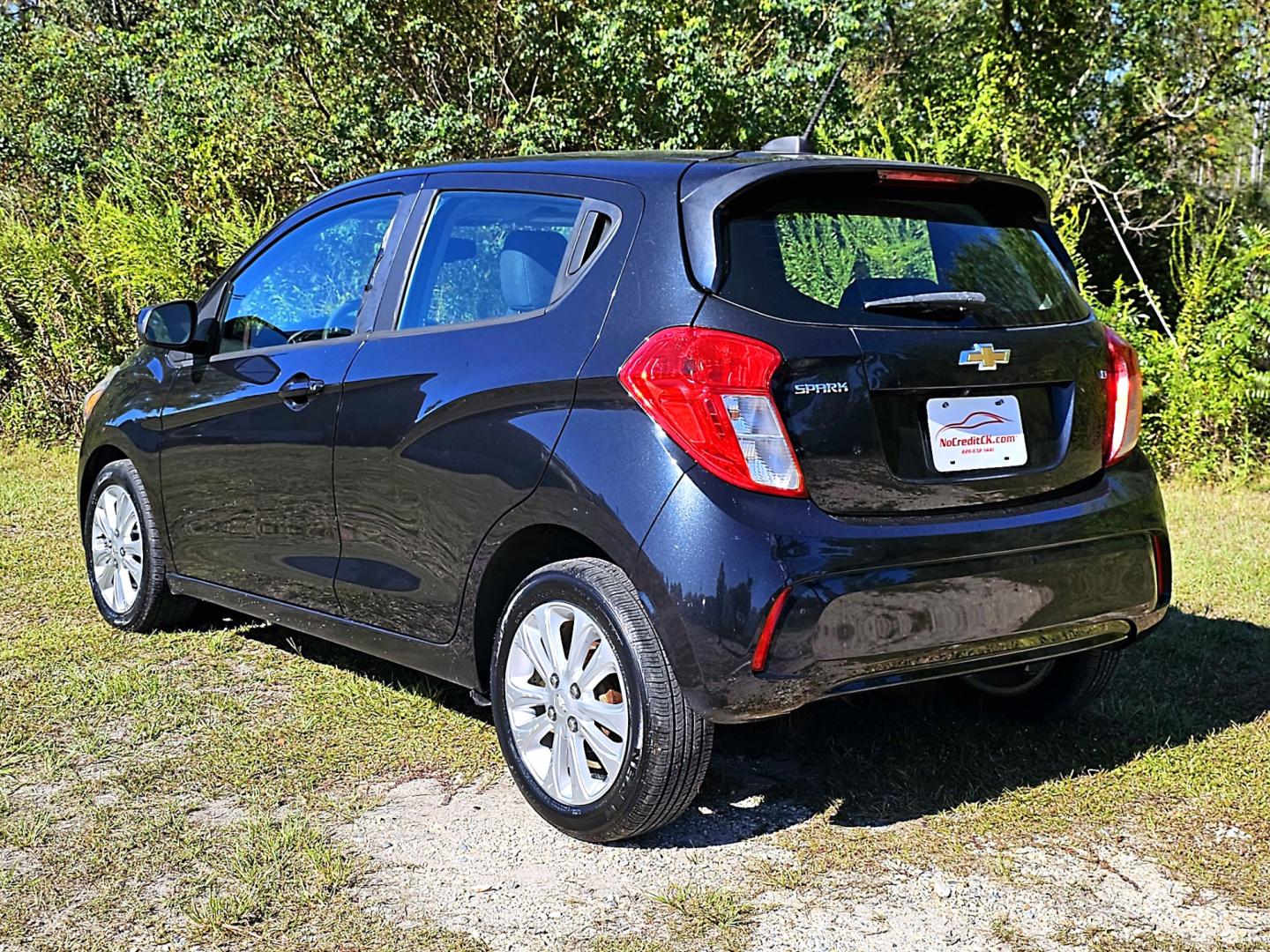 2016 Black Chevrolet Spark 1LT CVT (KL8CD6SA1GC) with an 1.4L L4 16V DOHC engine, CVT transmission, located at 18001 Kellogg Rd, Saucier, MS, 39574, (228) 832-1441, 139.421463, -76.641457 - Photo#6