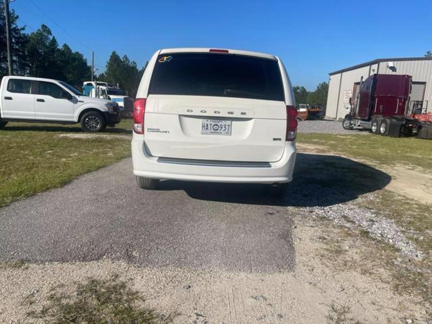 2013 White Dodge Grand Caravan Passenger SE Minivan 4D (2C4RDGBG4DR) with an 3.6L V6 DOHC 24V engine, Automatic, 6-Spd transmission, located at 18001 Kellogg Rd, Saucier, MS, 39574, (228) 832-1441, 139.421463, -76.641457 - Photo#7