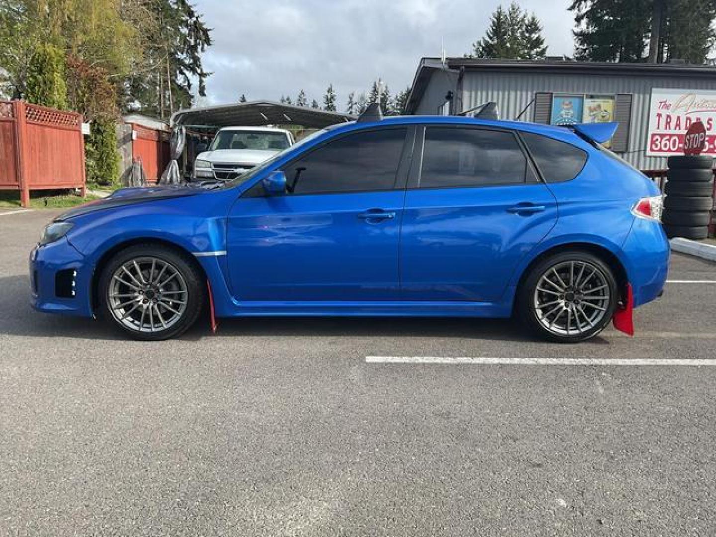 2014 Blue /Black Subaru Impreza WRX Wagon 4D (JF1GR7E69EG) , Manual, 5-Spd transmission, located at 18001 Kellogg Rd, Saucier, MS, 39574, (228) 832-1441, 39.421459, -76.641457 - **Dealer Statement: The Trade Store offers the nicest previously owned inventory you'll find of cars, vans, trucks and more. We offer many banks, credit unions and special financing options to fit your needs regardless of your credit, as well as sourcing of specific vehicles for qualified custom - Photo#1