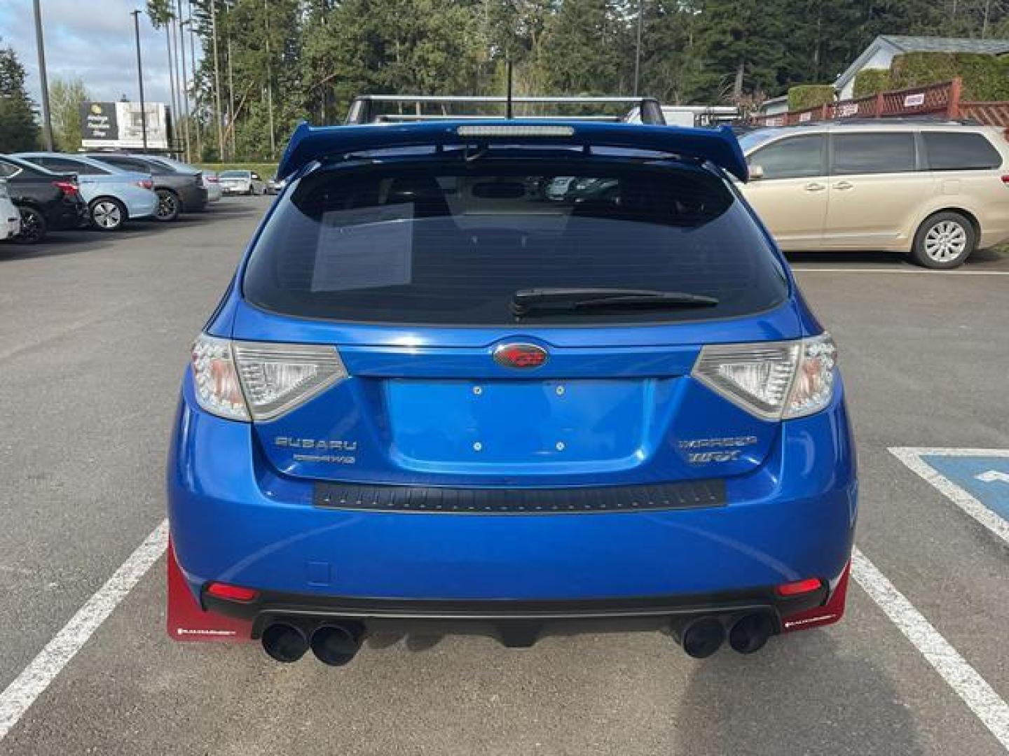 2014 Blue /Black Subaru Impreza WRX Wagon 4D (JF1GR7E69EG) , Manual, 5-Spd transmission, located at 18001 Kellogg Rd, Saucier, MS, 39574, (228) 832-1441, 39.421459, -76.641457 - **Dealer Statement: The Trade Store offers the nicest previously owned inventory you'll find of cars, vans, trucks and more. We offer many banks, credit unions and special financing options to fit your needs regardless of your credit, as well as sourcing of specific vehicles for qualified custom - Photo#3