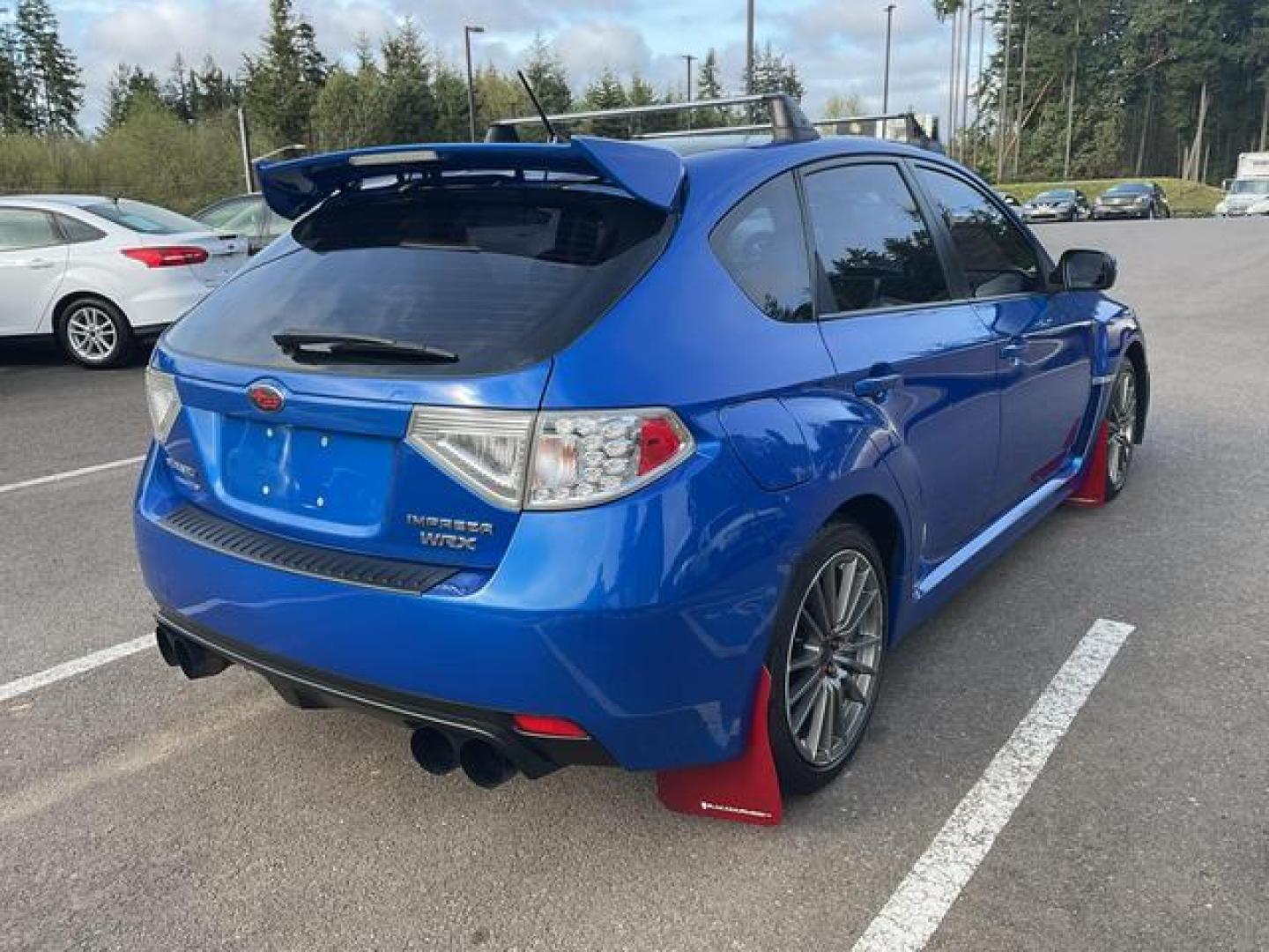 2014 Blue /Black Subaru Impreza WRX Wagon 4D (JF1GR7E69EG) , Manual, 5-Spd transmission, located at 18001 Kellogg Rd, Saucier, MS, 39574, (228) 832-1441, 39.421459, -76.641457 - **Dealer Statement: The Trade Store offers the nicest previously owned inventory you'll find of cars, vans, trucks and more. We offer many banks, credit unions and special financing options to fit your needs regardless of your credit, as well as sourcing of specific vehicles for qualified custom - Photo#4