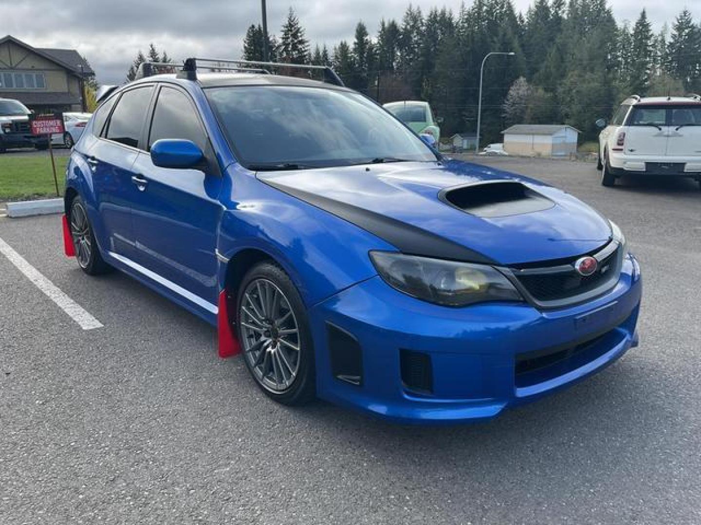 2014 Blue /Black Subaru Impreza WRX Wagon 4D (JF1GR7E69EG) , Manual, 5-Spd transmission, located at 18001 Kellogg Rd, Saucier, MS, 39574, (228) 832-1441, 39.421459, -76.641457 - **Dealer Statement: The Trade Store offers the nicest previously owned inventory you'll find of cars, vans, trucks and more. We offer many banks, credit unions and special financing options to fit your needs regardless of your credit, as well as sourcing of specific vehicles for qualified custom - Photo#6