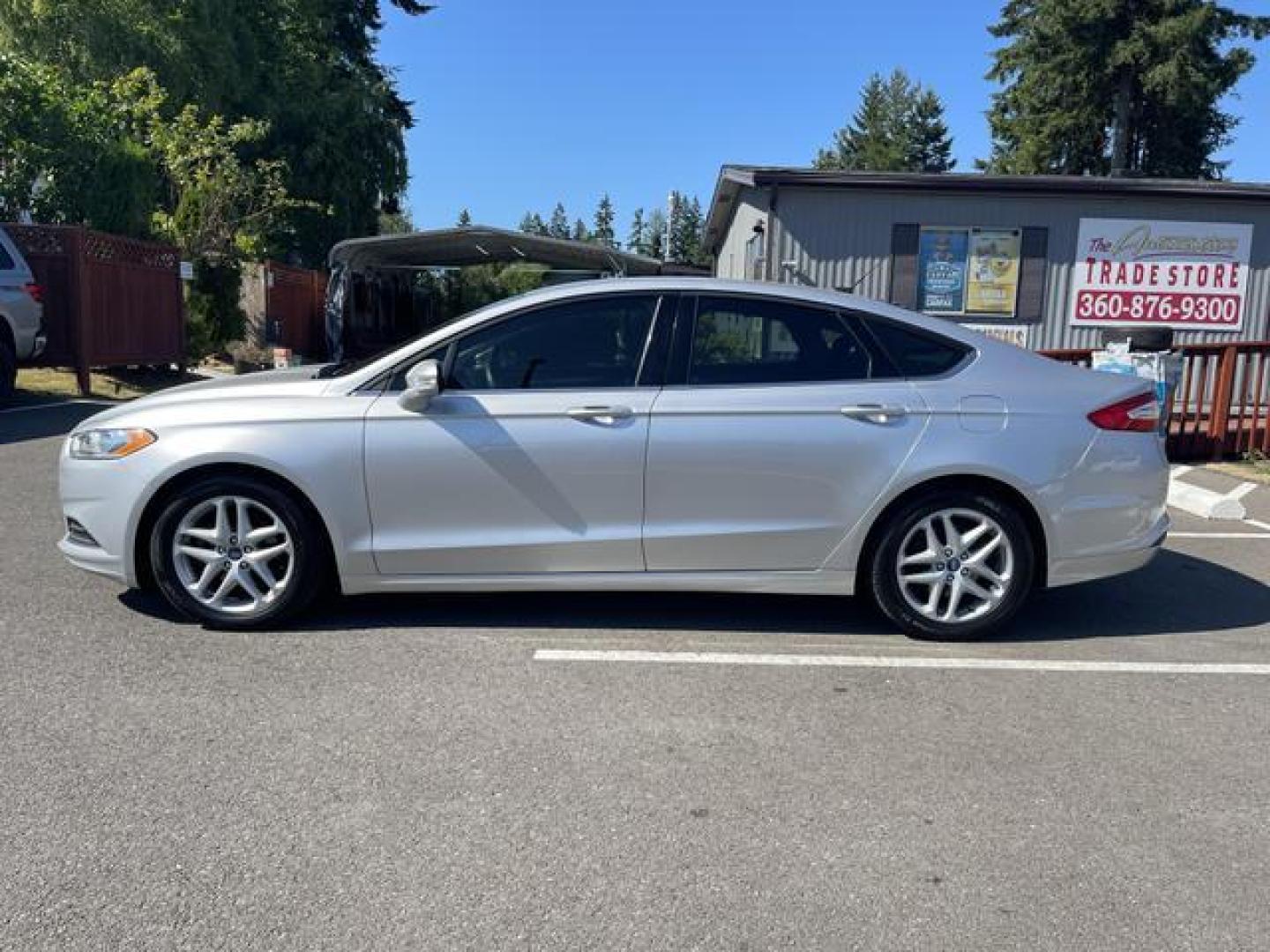 2016 Silver /Black Ford Fusion SE Sedan 4D (3FA6P0H76GR) , Auto, 6-Spd SelectShift transmission, located at 18001 Kellogg Rd, Saucier, MS, 39574, (228) 832-1441, 39.421459, -76.641457 - Photo#1