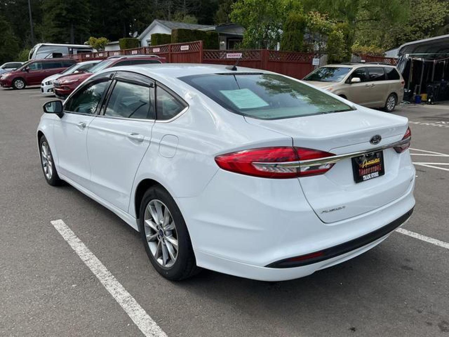 2017 White /Gray Ford Fusion SE Sedan 4D (3FA6P0H7XHR) , Auto, 6-Spd SelectShift transmission, located at 18001 Kellogg Rd, Saucier, MS, 39574, (228) 832-1441, 39.421459, -76.641457 - **Dealer Statement: The Trade Store offers the nicest previously owned inventory you'll find of cars, vans, trucks and more. We offer many banks, credit unions and special financing options to fit your needs regardless of your credit, as well as sourcing of specific vehicles for qualified custom - Photo#2