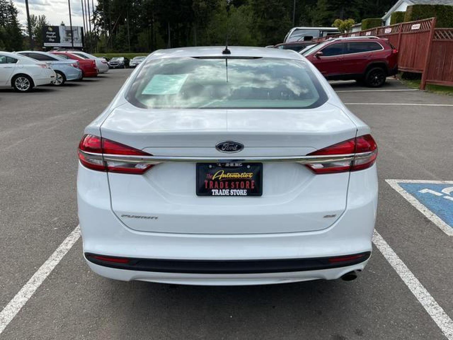 2017 White /Gray Ford Fusion SE Sedan 4D (3FA6P0H7XHR) , Auto, 6-Spd SelectShift transmission, located at 18001 Kellogg Rd, Saucier, MS, 39574, (228) 832-1441, 39.421459, -76.641457 - **Dealer Statement: The Trade Store offers the nicest previously owned inventory you'll find of cars, vans, trucks and more. We offer many banks, credit unions and special financing options to fit your needs regardless of your credit, as well as sourcing of specific vehicles for qualified custom - Photo#3