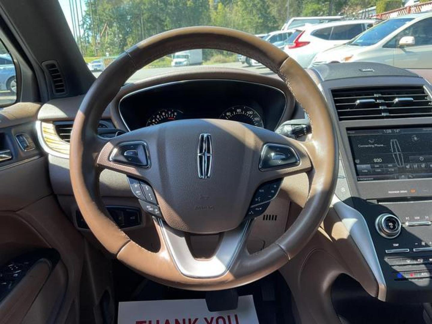 2015 White /Brown Lincoln MKC Sport Utility 4D (5LMTJ2AH7FU) , Auto, 6-Spd SelShft transmission, located at 18001 Kellogg Rd, Saucier, MS, 39574, (228) 832-1441, 39.421459, -76.641457 - Photo#13