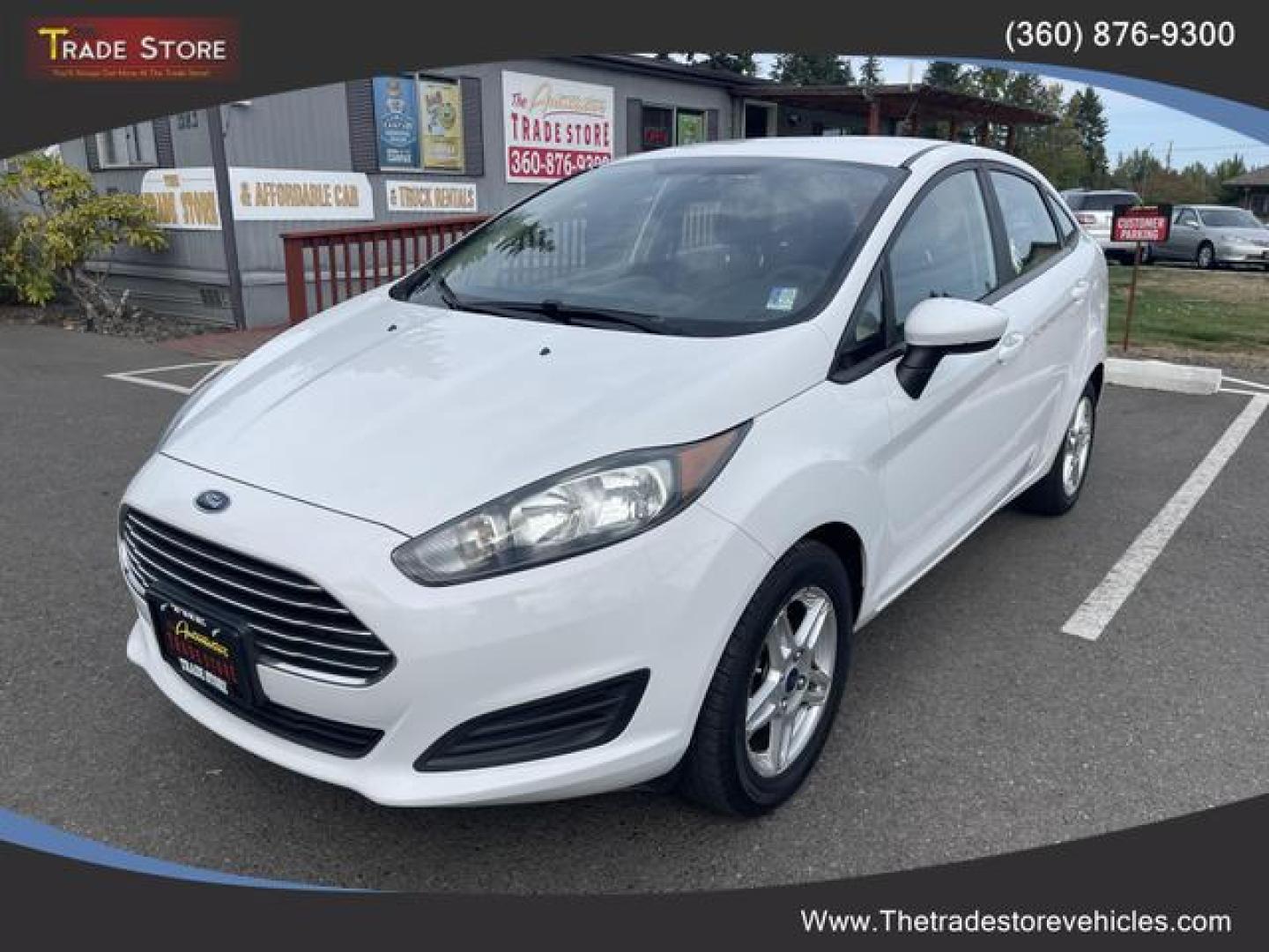 2017 White /Black Ford Fiesta SE Sedan 4D (3FADP4BJ9HM) , Auto, 6-Spd SelectShift transmission, located at 18001 Kellogg Rd, Saucier, MS, 39574, (228) 832-1441, 39.421459, -76.641457 - Photo#0