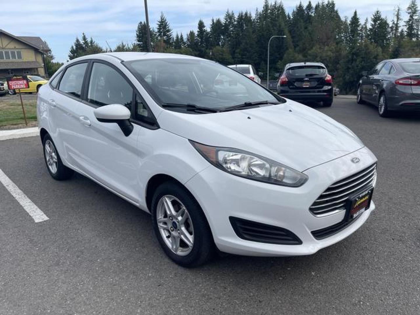 2017 White /Black Ford Fiesta SE Sedan 4D (3FADP4BJ9HM) , Auto, 6-Spd SelectShift transmission, located at 18001 Kellogg Rd, Saucier, MS, 39574, (228) 832-1441, 39.421459, -76.641457 - Photo#3