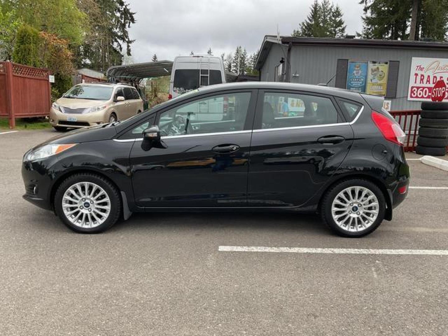 2015 Black /Black Ford Fiesta Titanium Hatchback 4D (3FADP4FJXFM) , Auto, 6-Spd SelectShift transmission, located at 18001 Kellogg Rd, Saucier, MS, 39574, (228) 832-1441, 39.421459, -76.641457 - **Dealer Statement: The Trade Store offers the nicest previously owned inventory you'll find of cars, vans, trucks and more. We offer many banks, credit unions and special financing options to fit your needs regardless of your credit, as well as sourcing of specific vehicles for qualified custom - Photo#1