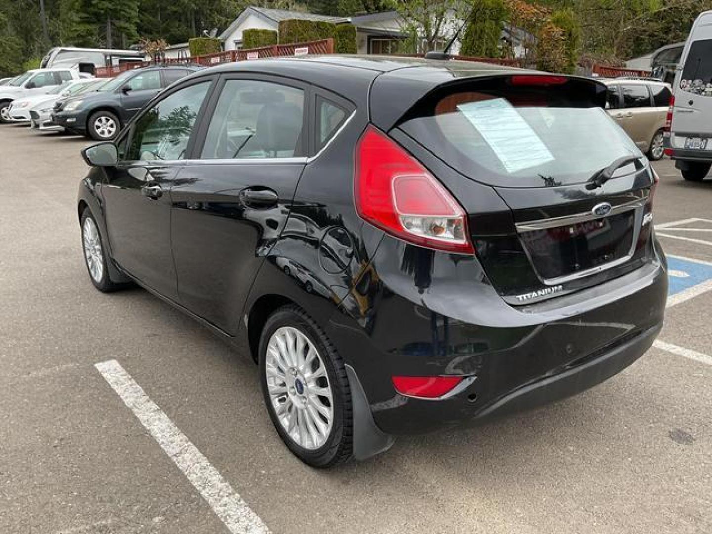 2015 Black /Black Ford Fiesta Titanium Hatchback 4D (3FADP4FJXFM) , Auto, 6-Spd SelectShift transmission, located at 18001 Kellogg Rd, Saucier, MS, 39574, (228) 832-1441, 39.421459, -76.641457 - **Dealer Statement: The Trade Store offers the nicest previously owned inventory you'll find of cars, vans, trucks and more. We offer many banks, credit unions and special financing options to fit your needs regardless of your credit, as well as sourcing of specific vehicles for qualified custom - Photo#2