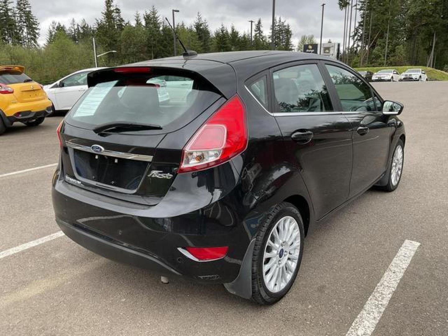 2015 Black /Black Ford Fiesta Titanium Hatchback 4D (3FADP4FJXFM) , Auto, 6-Spd SelectShift transmission, located at 18001 Kellogg Rd, Saucier, MS, 39574, (228) 832-1441, 39.421459, -76.641457 - **Dealer Statement: The Trade Store offers the nicest previously owned inventory you'll find of cars, vans, trucks and more. We offer many banks, credit unions and special financing options to fit your needs regardless of your credit, as well as sourcing of specific vehicles for qualified custom - Photo#4