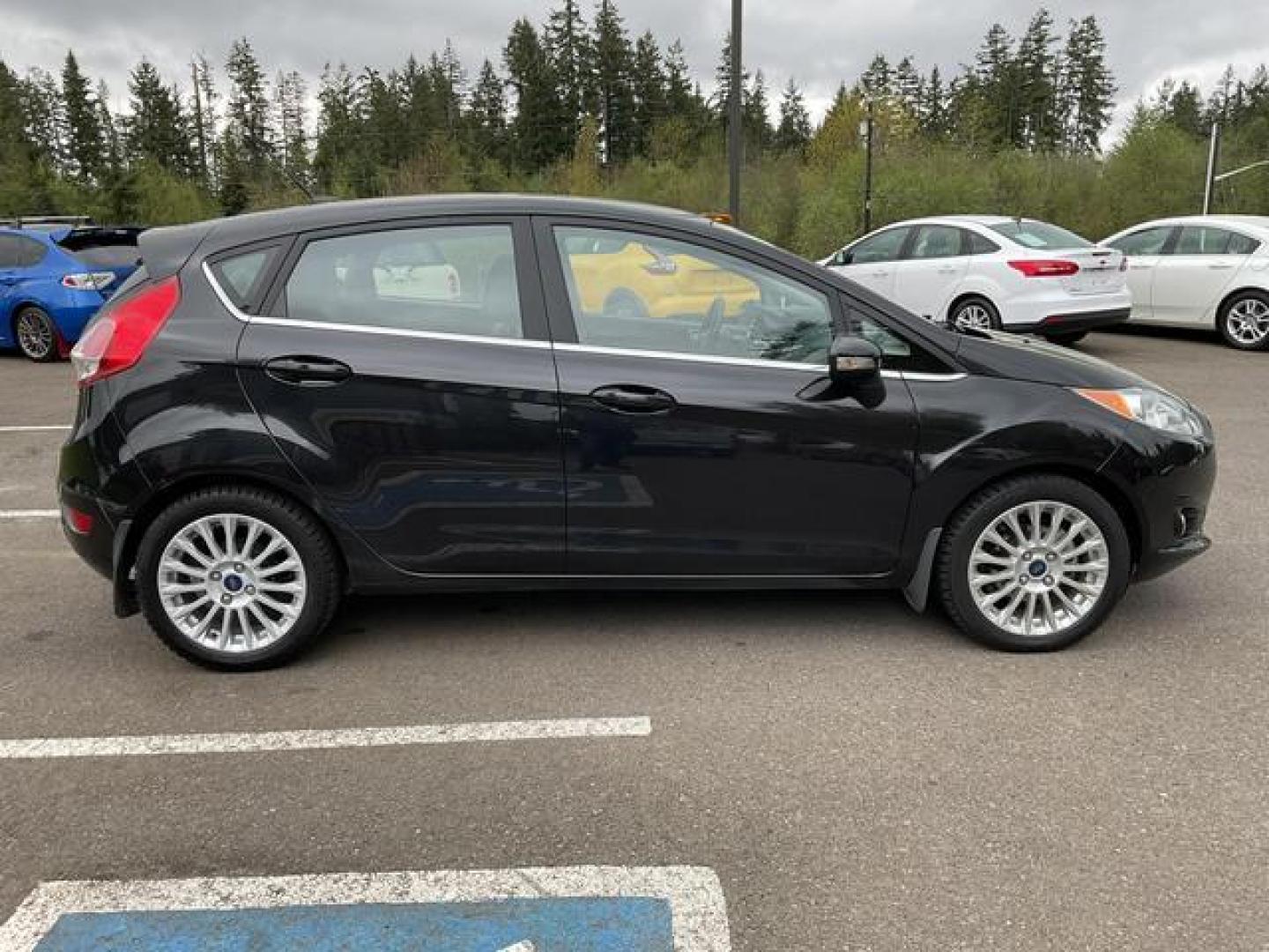 2015 Black /Black Ford Fiesta Titanium Hatchback 4D (3FADP4FJXFM) , Auto, 6-Spd SelectShift transmission, located at 18001 Kellogg Rd, Saucier, MS, 39574, (228) 832-1441, 39.421459, -76.641457 - **Dealer Statement: The Trade Store offers the nicest previously owned inventory you'll find of cars, vans, trucks and more. We offer many banks, credit unions and special financing options to fit your needs regardless of your credit, as well as sourcing of specific vehicles for qualified custom - Photo#5