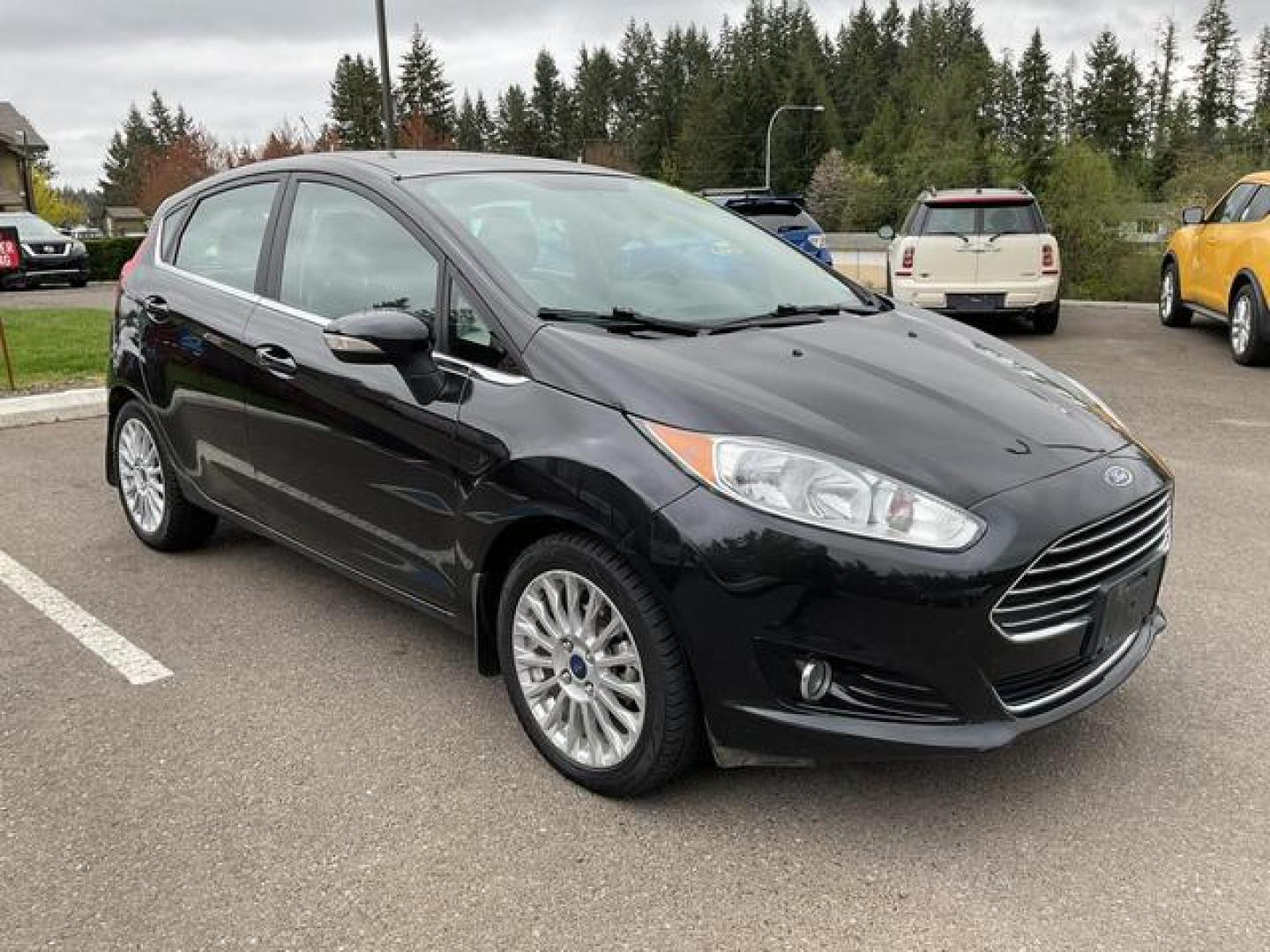 2015 Black /Black Ford Fiesta Titanium Hatchback 4D (3FADP4FJXFM) , Auto, 6-Spd SelectShift transmission, located at 18001 Kellogg Rd, Saucier, MS, 39574, (228) 832-1441, 39.421459, -76.641457 - **Dealer Statement: The Trade Store offers the nicest previously owned inventory you'll find of cars, vans, trucks and more. We offer many banks, credit unions and special financing options to fit your needs regardless of your credit, as well as sourcing of specific vehicles for qualified custom - Photo#6