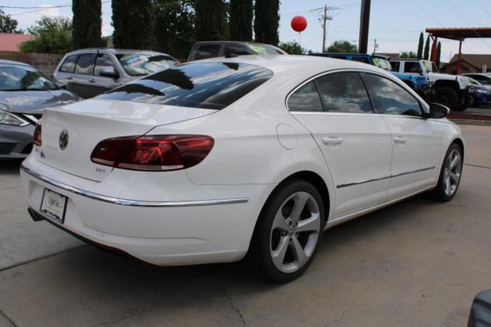 2013 Candy White /Black Leatherette Volkswagen CC Lux Sedan 4D (WVWRP7AN4DE) , Automatic, 6-Spd DSG w/Tiptronic transmission, located at 18001 Kellogg Rd, Saucier, MS, 39574, (228) 832-1441, 39.421459, -76.641457 - ~ TEXT or CALL 928 775 5O6O ~ 5STARCARS .C0M ~** TURBOCHARGED! ~ LOADED LUX SEDAN! ~ SUPER NICE!** EXCEPTIONAL CONDITION! 4.2 of 5 Third Party Condition Report! ** GREAT MAINTENANCE HISTORY! Well Taken Care of! ** Inspected - Tested - Professionally Serviced and Renewed!** READY for MANY MORE Yea - Photo#1