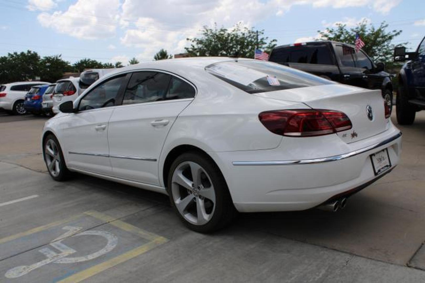 2013 Candy White /Black Leatherette Volkswagen CC Lux Sedan 4D (WVWRP7AN4DE) , Automatic, 6-Spd DSG w/Tiptronic transmission, located at 18001 Kellogg Rd, Saucier, MS, 39574, (228) 832-1441, 39.421459, -76.641457 - ~ TEXT or CALL 928 775 5O6O ~ 5STARCARS .C0M ~** TURBOCHARGED! ~ LOADED LUX SEDAN! ~ SUPER NICE!** EXCEPTIONAL CONDITION! 4.2 of 5 Third Party Condition Report! ** GREAT MAINTENANCE HISTORY! Well Taken Care of! ** Inspected - Tested - Professionally Serviced and Renewed!** READY for MANY MORE Yea - Photo#2