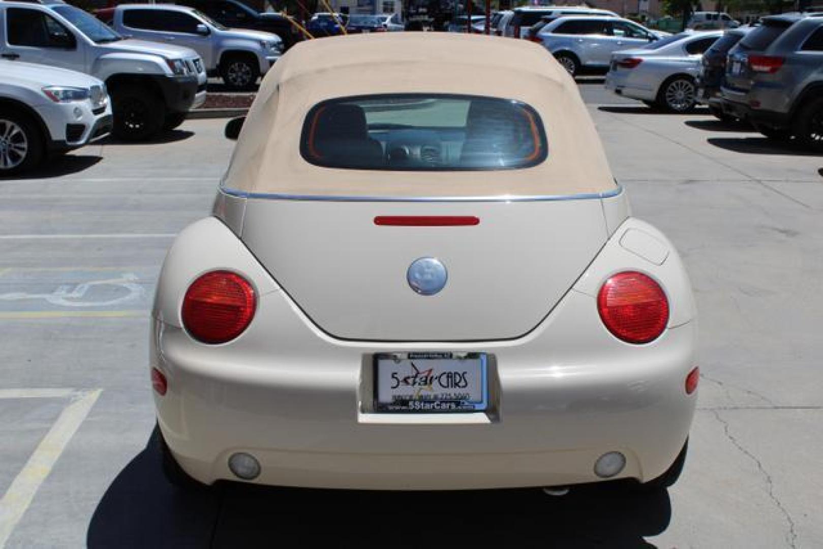 2005 White /Beige Volkswagen New Beetle GLS Convertible 2D (3VWCM31Y35M) , Automatic w/Tiptronic transmission, located at 18001 Kellogg Rd, Saucier, MS, 39574, (228) 832-1441, 39.421459, -76.641457 - ~ TEXT or CALL 928 775 5O6O ~ 5STARCARS .C0M ~** SOFT TOP CONVERTIBLE ~ GAS SAVER! ~ SUPER NICE!** EXCELLENT CONDITION! Well Taken Care of! ** READY for MANY MORE Years of Great Service!** Certified CLEAN AutoCheck w/ No Accidents/No Issues!** Front Wheel Drive ~ Hercules Tires on 16' Alloys!** 4 - Photo#13