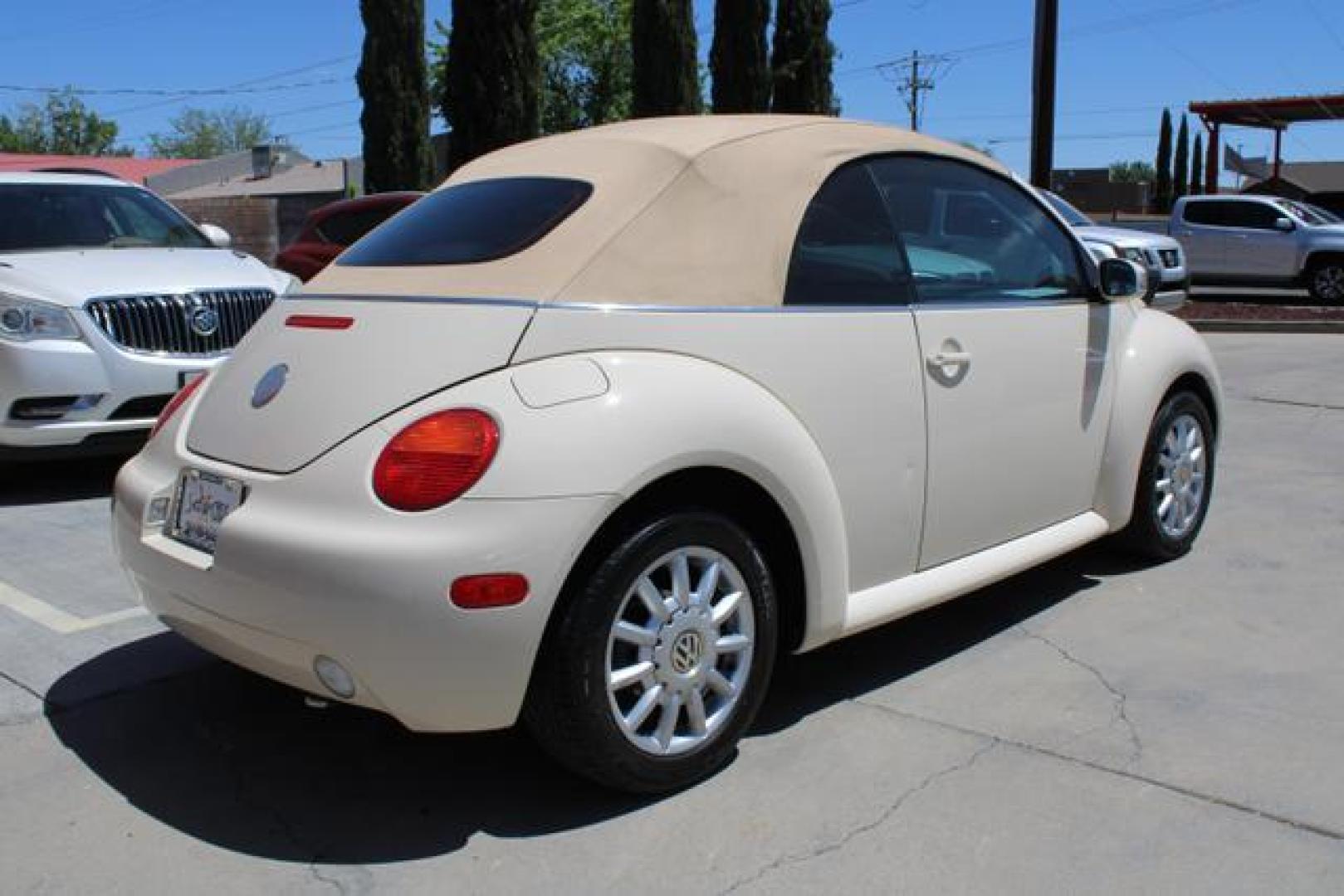 2005 White /Beige Volkswagen New Beetle GLS Convertible 2D (3VWCM31Y35M) , Automatic w/Tiptronic transmission, located at 18001 Kellogg Rd, Saucier, MS, 39574, (228) 832-1441, 39.421459, -76.641457 - ~ TEXT or CALL 928 775 5O6O ~ 5STARCARS .C0M ~** SOFT TOP CONVERTIBLE ~ GAS SAVER! ~ SUPER NICE!** EXCELLENT CONDITION! Well Taken Care of! ** READY for MANY MORE Years of Great Service!** Certified CLEAN AutoCheck w/ No Accidents/No Issues!** Front Wheel Drive ~ Hercules Tires on 16' Alloys!** 4 - Photo#1