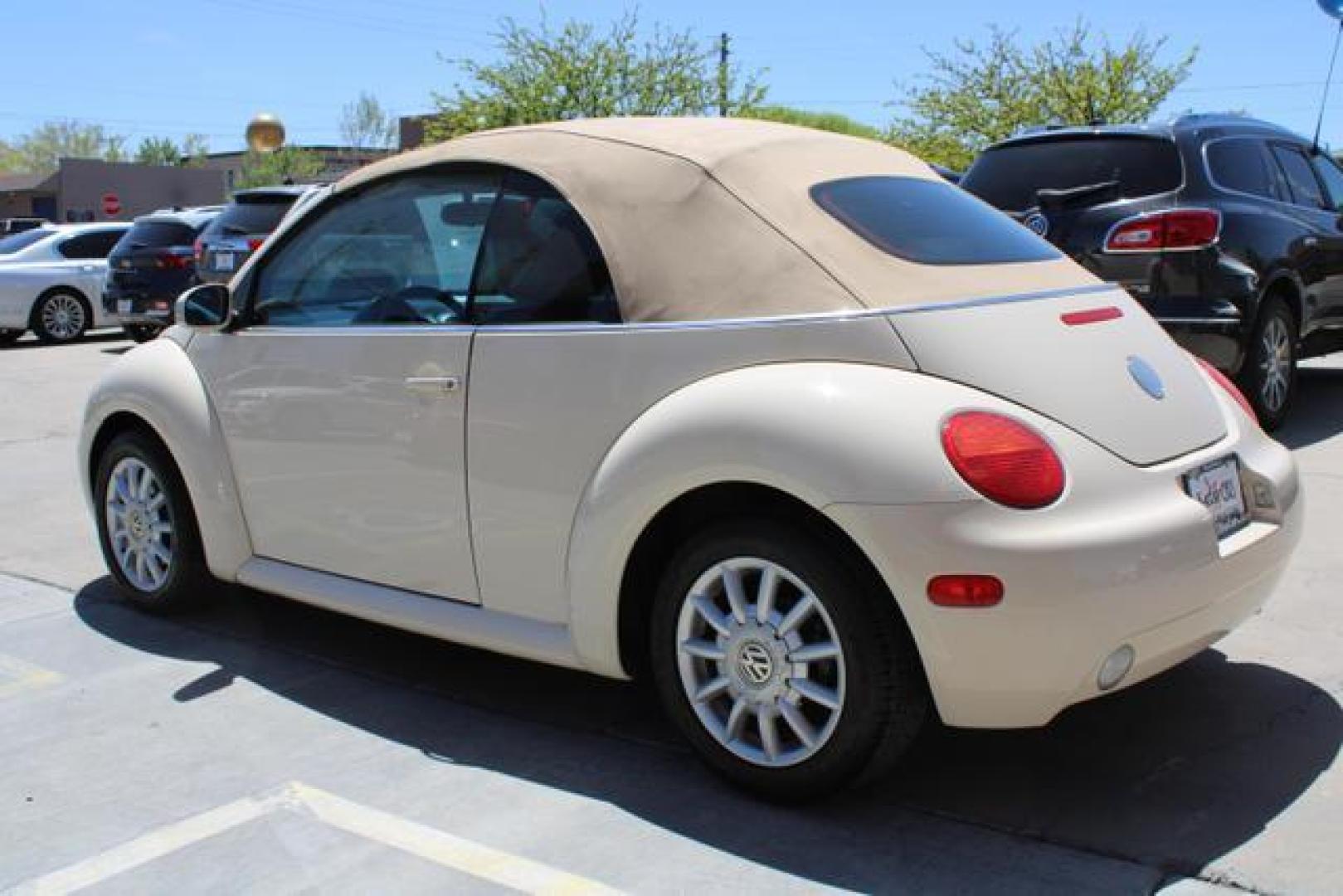 2005 White /Beige Volkswagen New Beetle GLS Convertible 2D (3VWCM31Y35M) , Automatic w/Tiptronic transmission, located at 18001 Kellogg Rd, Saucier, MS, 39574, (228) 832-1441, 39.421459, -76.641457 - ~ TEXT or CALL 928 775 5O6O ~ 5STARCARS .C0M ~** SOFT TOP CONVERTIBLE ~ GAS SAVER! ~ SUPER NICE!** EXCELLENT CONDITION! Well Taken Care of! ** READY for MANY MORE Years of Great Service!** Certified CLEAN AutoCheck w/ No Accidents/No Issues!** Front Wheel Drive ~ Hercules Tires on 16' Alloys!** 4 - Photo#2