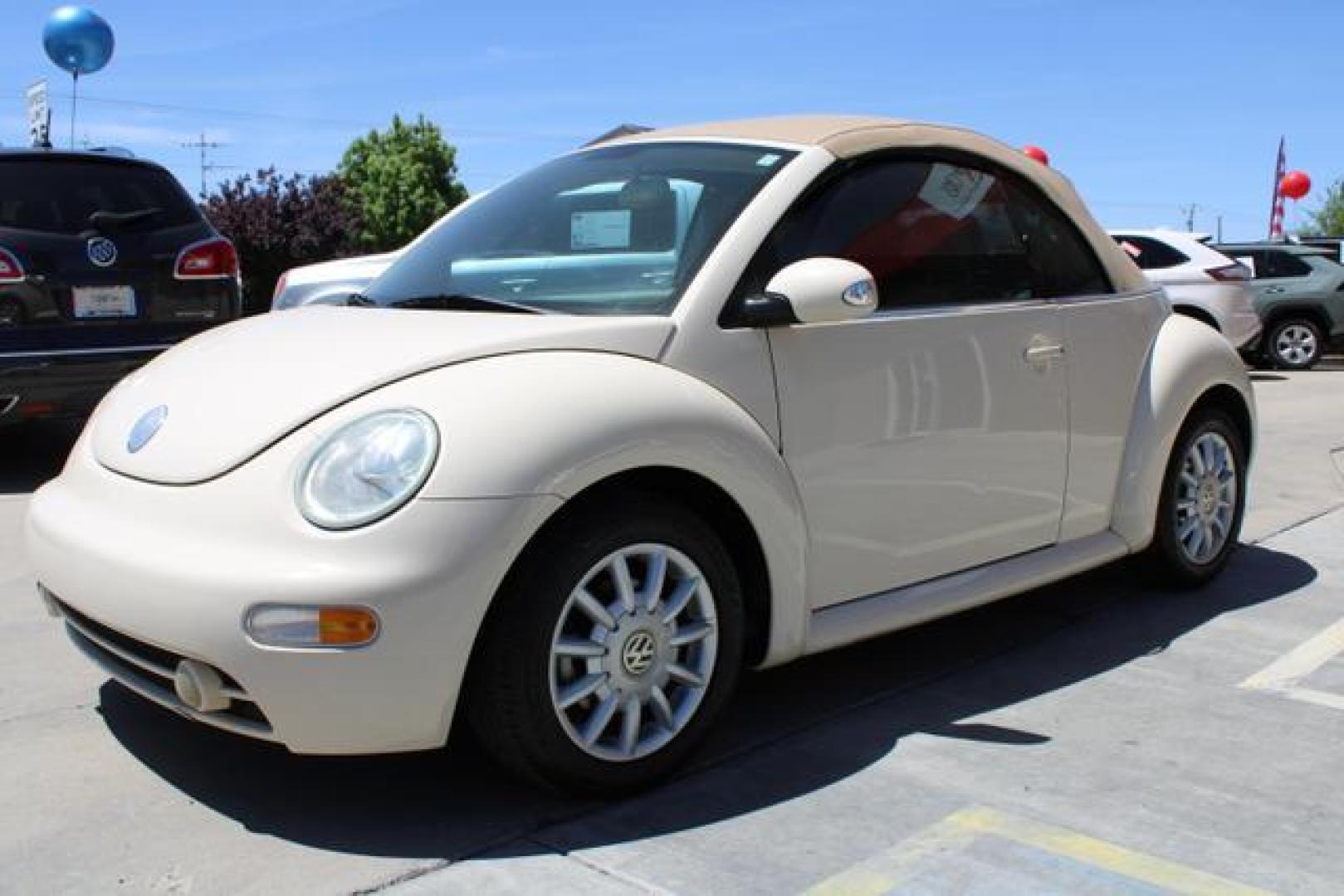 2005 White /Beige Volkswagen New Beetle GLS Convertible 2D (3VWCM31Y35M) , Automatic w/Tiptronic transmission, located at 18001 Kellogg Rd, Saucier, MS, 39574, (228) 832-1441, 39.421459, -76.641457 - ~ TEXT or CALL 928 775 5O6O ~ 5STARCARS .C0M ~** SOFT TOP CONVERTIBLE ~ GAS SAVER! ~ SUPER NICE!** EXCELLENT CONDITION! Well Taken Care of! ** READY for MANY MORE Years of Great Service!** Certified CLEAN AutoCheck w/ No Accidents/No Issues!** Front Wheel Drive ~ Hercules Tires on 16' Alloys!** 4 - Photo#3