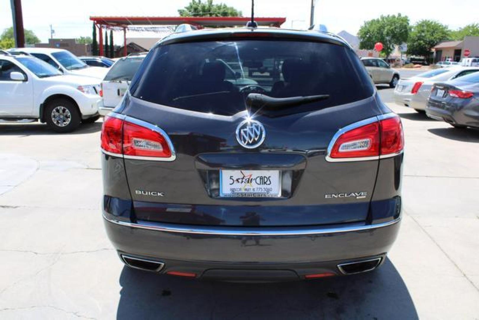 2017 Brown /Black Leather Buick Enclave Leather Sport Utility 4D (5GAKVBKD4HJ) , Auto, 6-Spd Overdrive transmission, located at 18001 Kellogg Rd, Saucier, MS, 39574, (228) 832-1441, 39.421459, -76.641457 - ~ TEXT or CALL 928 775 5O6O ~ 5STARCARS .C0M ~** AWD! ~ TWO OWNER! ~ 3RD ROW! ~ LOADED LEATHER GRP!** PRISTINE CONDITION Inside and Out! 5 of 5 Condition Report! ** Inspected - Tested - Professionally Serviced and Renewed!** READY for MANY MORE Years of Great Service!** Certified CLEAN CARFAX! No - Photo#13