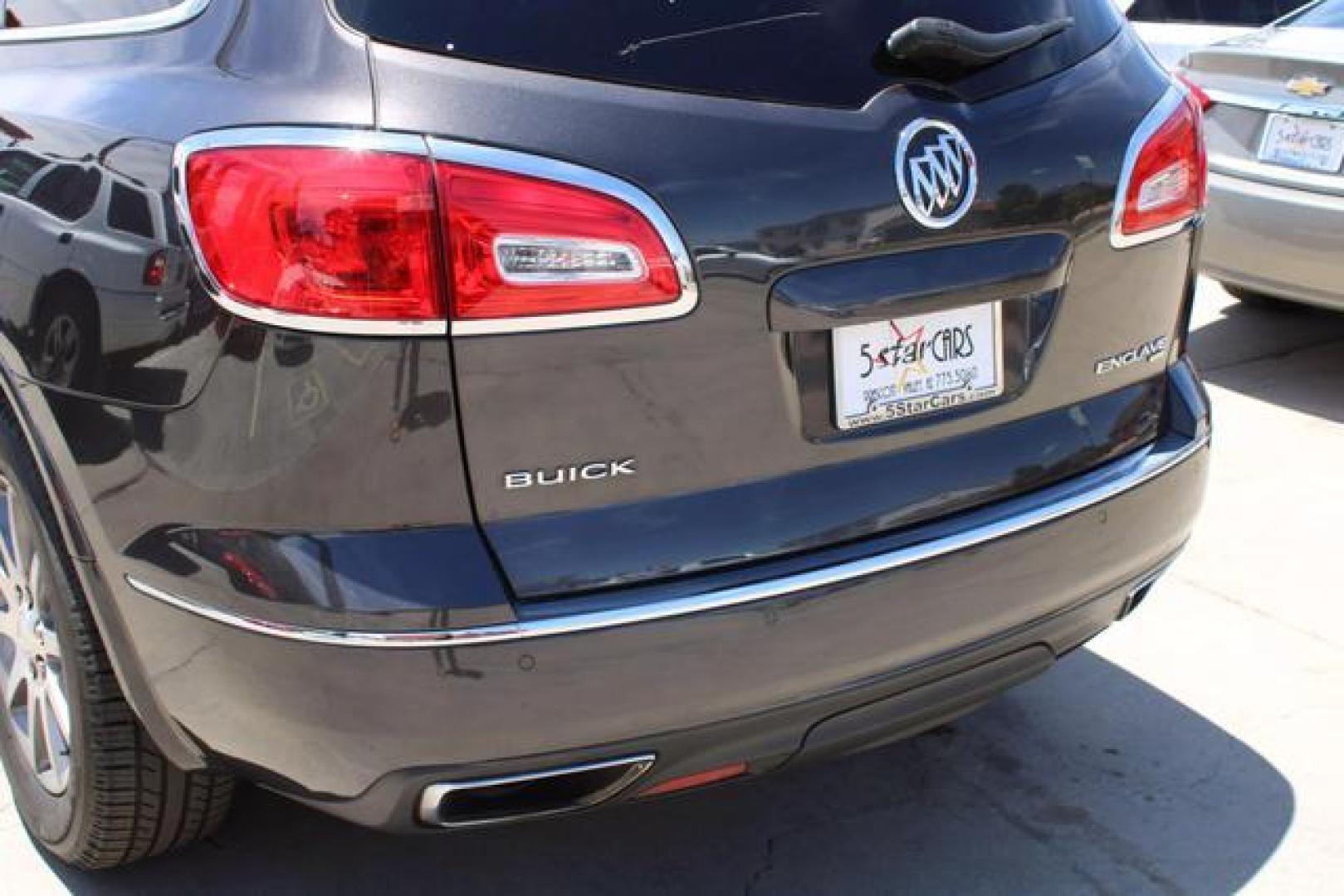 2017 Brown /Black Leather Buick Enclave Leather Sport Utility 4D (5GAKVBKD4HJ) , Auto, 6-Spd Overdrive transmission, located at 18001 Kellogg Rd, Saucier, MS, 39574, (228) 832-1441, 39.421459, -76.641457 - ~ TEXT or CALL 928 775 5O6O ~ 5STARCARS .C0M ~** AWD! ~ TWO OWNER! ~ 3RD ROW! ~ LOADED LEATHER GRP!** PRISTINE CONDITION Inside and Out! 5 of 5 Condition Report! ** Inspected - Tested - Professionally Serviced and Renewed!** READY for MANY MORE Years of Great Service!** Certified CLEAN CARFAX! No - Photo#14