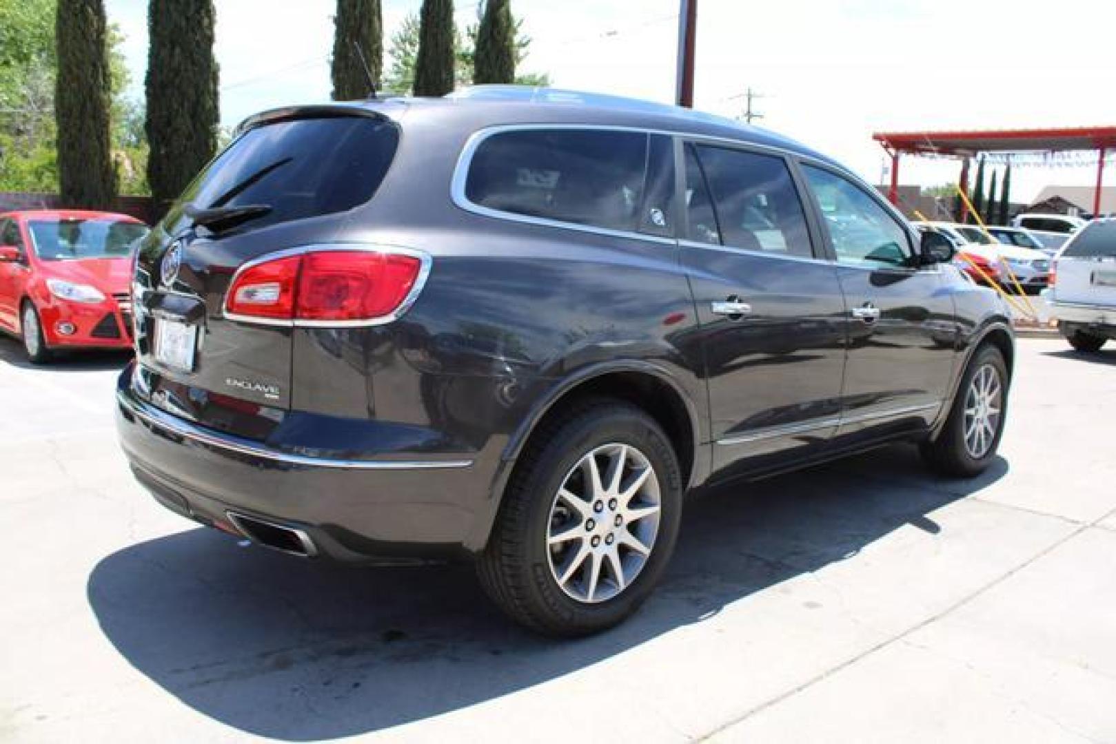 2017 Brown /Black Leather Buick Enclave Leather Sport Utility 4D (5GAKVBKD4HJ) , Auto, 6-Spd Overdrive transmission, located at 18001 Kellogg Rd, Saucier, MS, 39574, (228) 832-1441, 39.421459, -76.641457 - ~ TEXT or CALL 928 775 5O6O ~ 5STARCARS .C0M ~** AWD! ~ TWO OWNER! ~ 3RD ROW! ~ LOADED LEATHER GRP!** PRISTINE CONDITION Inside and Out! 5 of 5 Condition Report! ** Inspected - Tested - Professionally Serviced and Renewed!** READY for MANY MORE Years of Great Service!** Certified CLEAN CARFAX! No - Photo#1