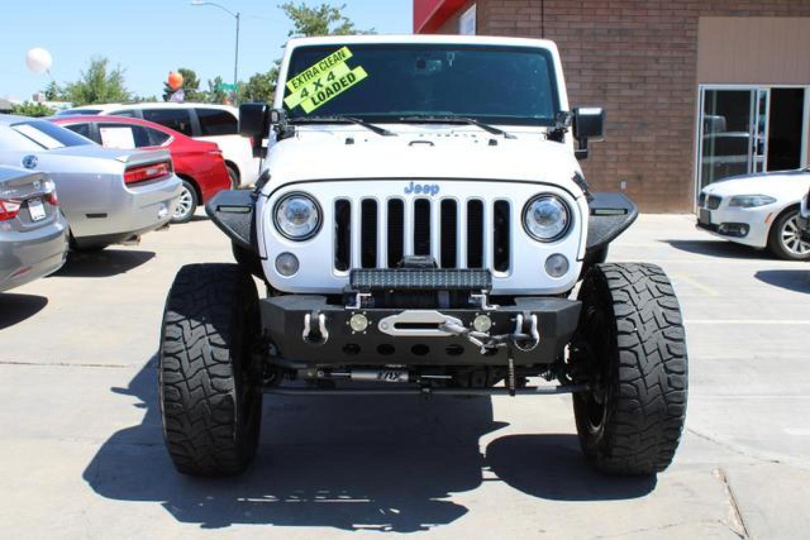 2018 White /Gray Jeep Wrangler Unlimited Sahara (JK) Sport Utility 4D (1C4HJWEG2JL) , Automatic, 5-Spd transmission, located at 18001 Kellogg Rd, Saucier, MS, 39574, (228) 832-1441, 39.421459, -76.641457 - Photo#18