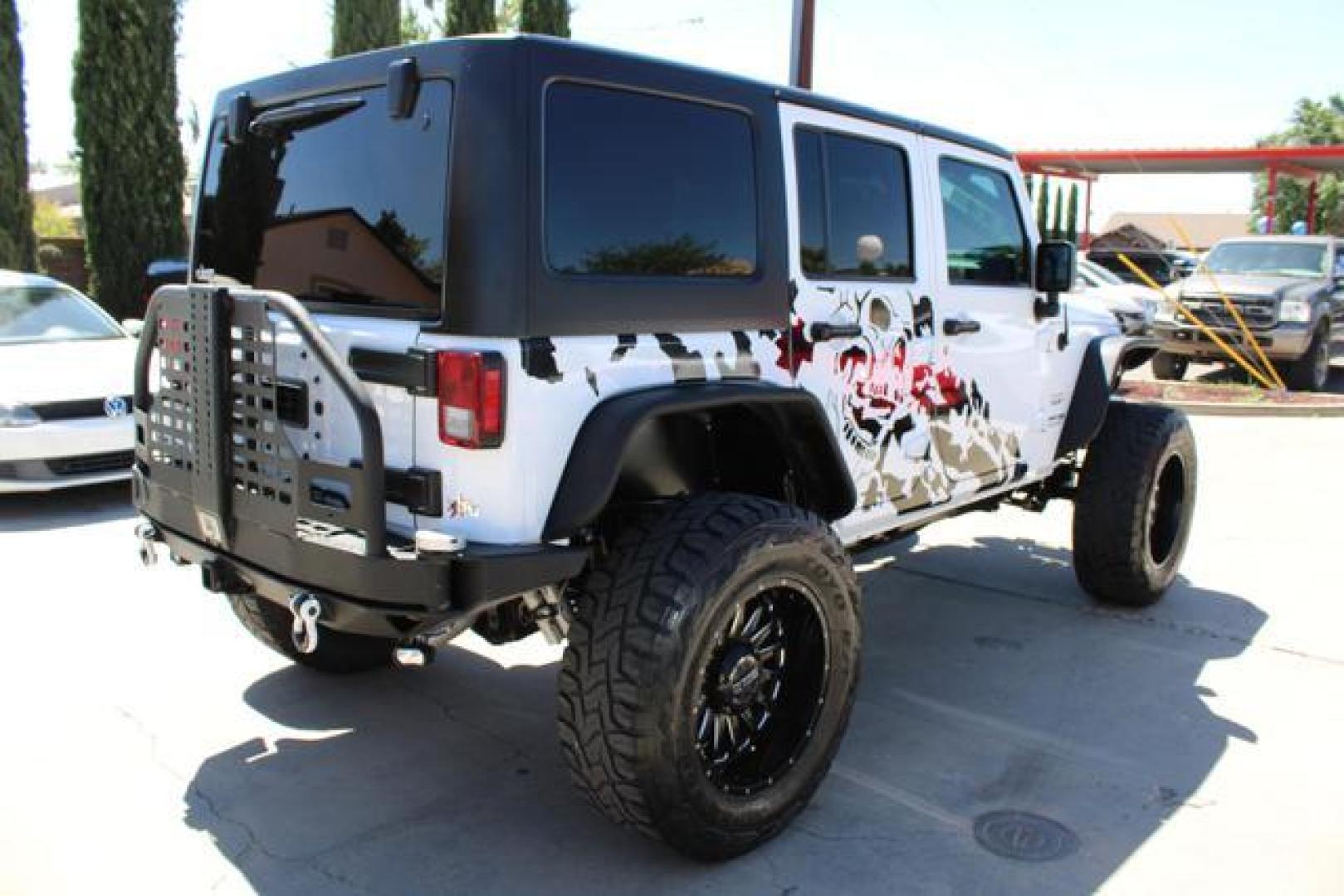 2018 White /Gray Jeep Wrangler Unlimited Sahara (JK) Sport Utility 4D (1C4HJWEG2JL) , Automatic, 5-Spd transmission, located at 18001 Kellogg Rd, Saucier, MS, 39574, (228) 832-1441, 39.421459, -76.641457 - Photo#1