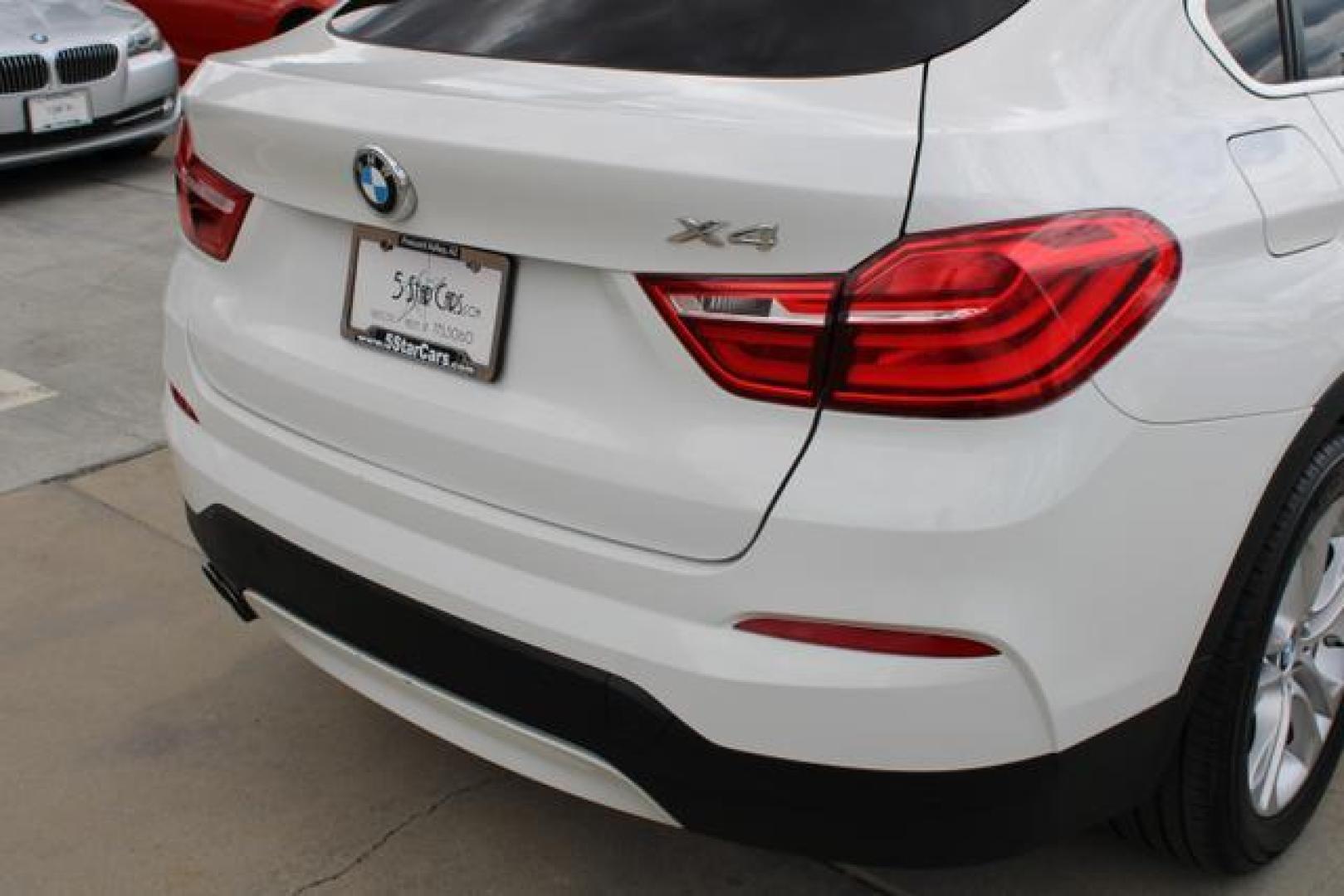 2015 Alpine White /Black Leather BMW X4 xDrive28i Sport Utility 4D (5UXXW3C52F0) , Auto, 8-Spd Spt Manual transmission, located at 18001 Kellogg Rd, Saucier, MS, 39574, (228) 832-1441, 39.421459, -76.641457 - Photo#14