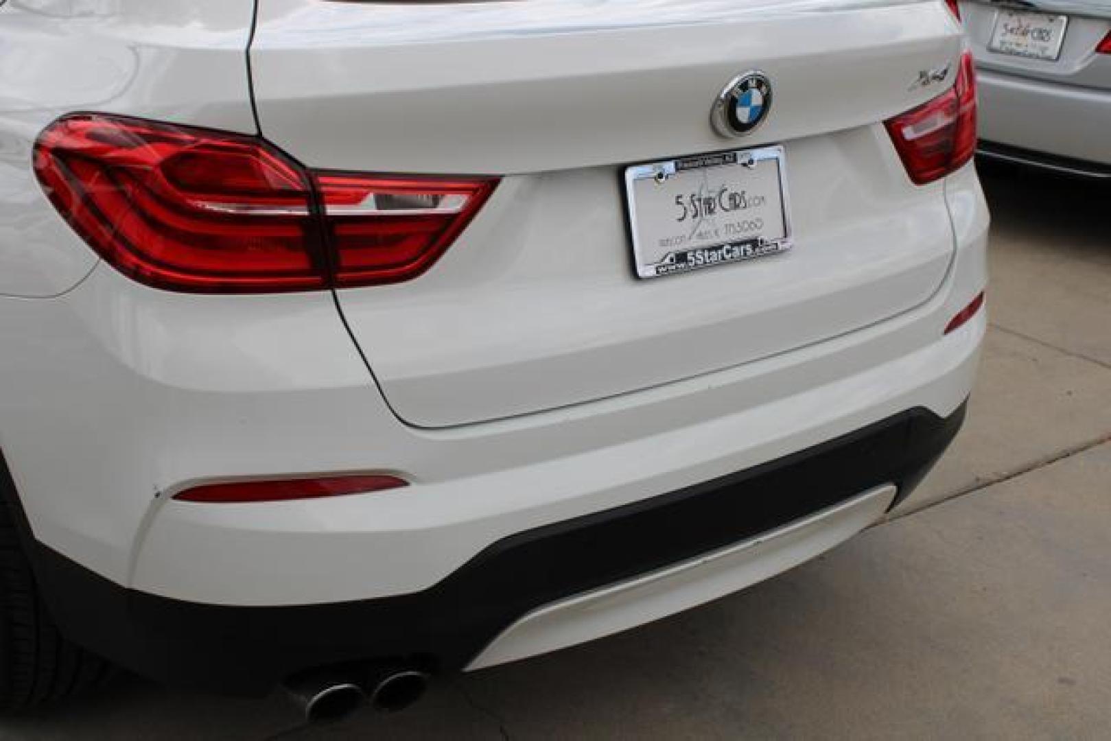 2015 Alpine White /Black Leather BMW X4 xDrive28i Sport Utility 4D (5UXXW3C52F0) , Auto, 8-Spd Spt Manual transmission, located at 18001 Kellogg Rd, Saucier, MS, 39574, (228) 832-1441, 39.421459, -76.641457 - Photo#16