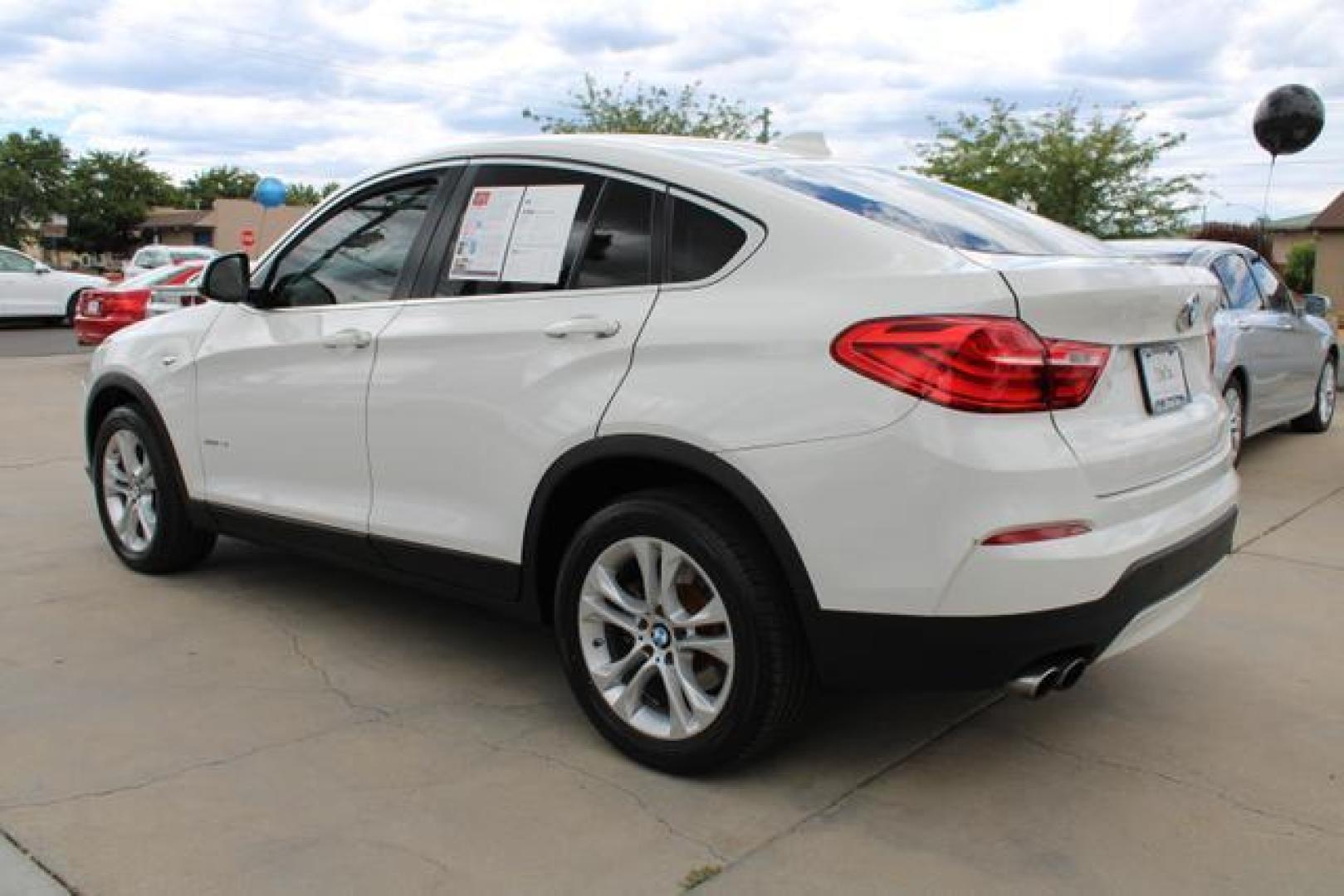 2015 Alpine White /Black Leather BMW X4 xDrive28i Sport Utility 4D (5UXXW3C52F0) , Auto, 8-Spd Spt Manual transmission, located at 18001 Kellogg Rd, Saucier, MS, 39574, (228) 832-1441, 39.421459, -76.641457 - Photo#2