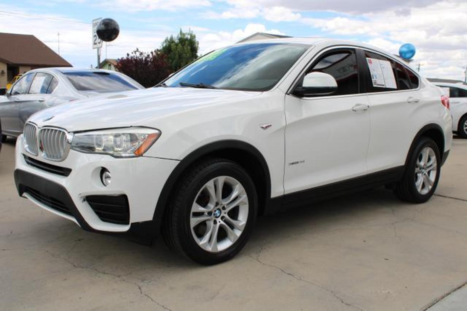 2015 Alpine White /Black Leather BMW X4 xDrive28i Sport Utility 4D (5UXXW3C52F0) , Auto, 8-Spd Spt Manual transmission, located at 18001 Kellogg Rd, Saucier, MS, 39574, (228) 832-1441, 39.421459, -76.641457 - Photo#3