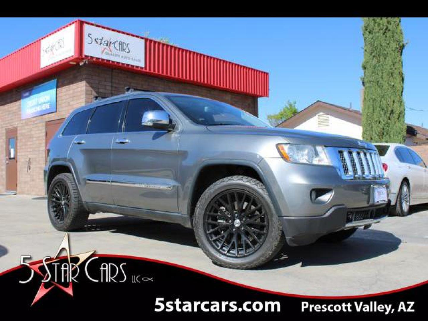 2012 Gray /Brown Jeep Grand Cherokee Overland Sport Utility 4D (1C4RJFCT9CC) , Automatic, 6-Spd transmission, located at 18001 Kellogg Rd, Saucier, MS, 39574, (228) 832-1441, 39.421459, -76.641457 - Photo#0