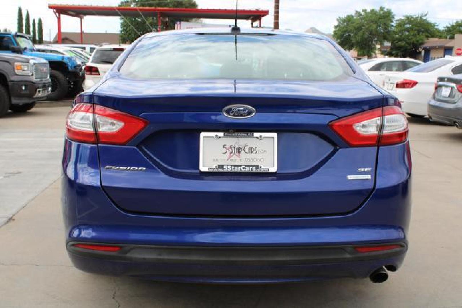 2016 Blue /Black Ford Fusion SE Sedan 4D (3FA6P0HD1GR) , Auto, 6-Spd SelectShift transmission, located at 18001 Kellogg Rd, Saucier, MS, 39574, (228) 832-1441, 39.421459, -76.641457 - Photo#14