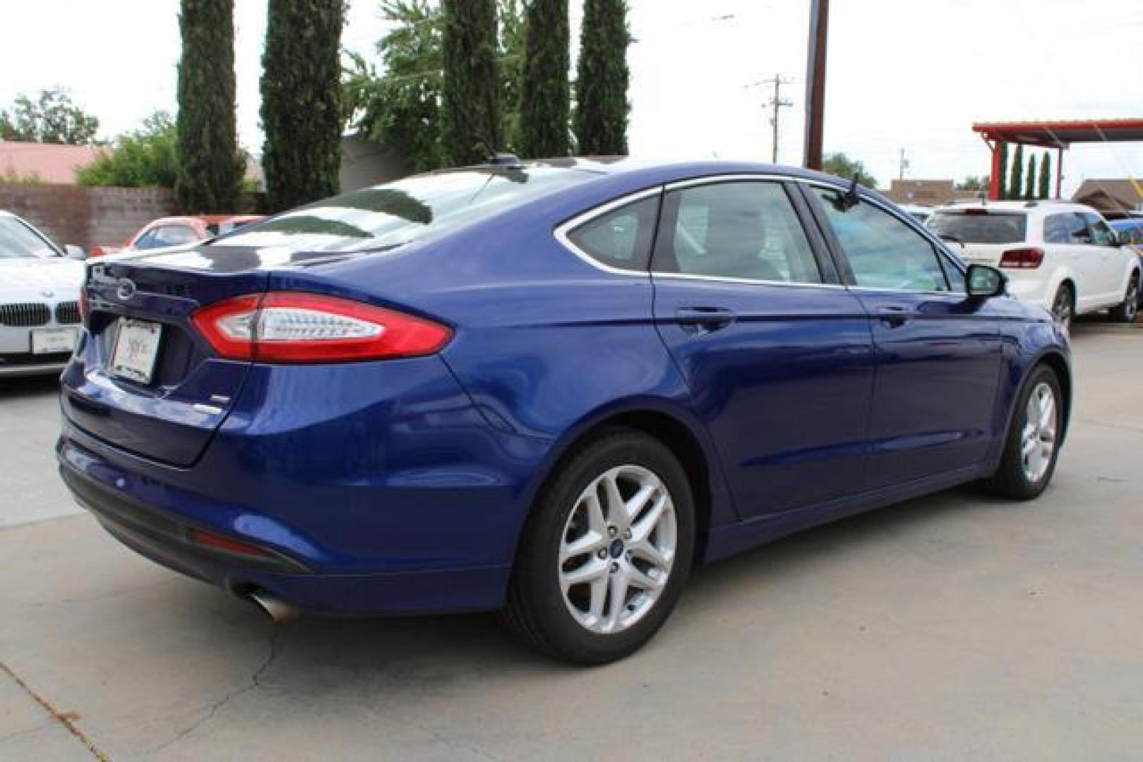 2016 Blue /Black Ford Fusion SE Sedan 4D (3FA6P0HD1GR) , Auto, 6-Spd SelectShift transmission, located at 18001 Kellogg Rd, Saucier, MS, 39574, (228) 832-1441, 39.421459, -76.641457 - Photo#1