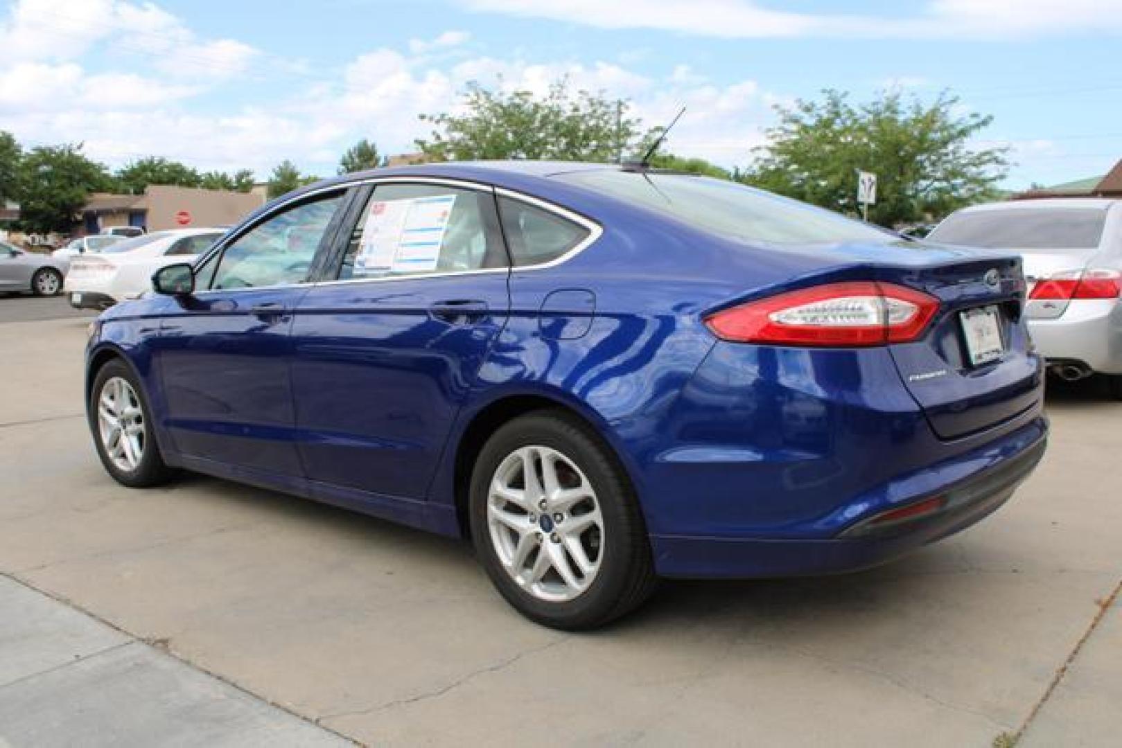 2016 Blue /Black Ford Fusion SE Sedan 4D (3FA6P0HD1GR) , Auto, 6-Spd SelectShift transmission, located at 18001 Kellogg Rd, Saucier, MS, 39574, (228) 832-1441, 39.421459, -76.641457 - Photo#2