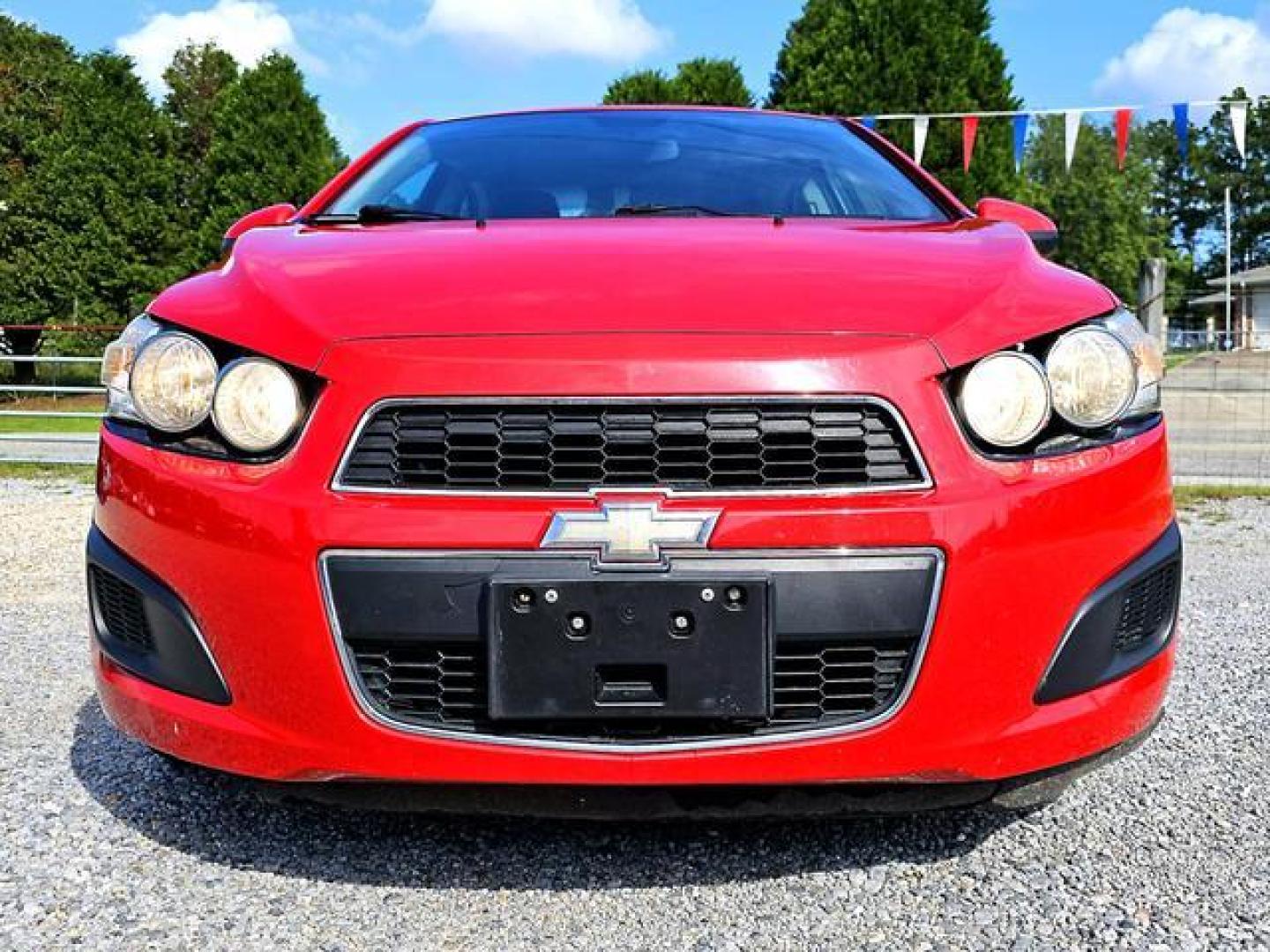 2012 Red /Grey Chevrolet Sonic LT Sedan 4D (1G1JC5SH7C4) , Automatic, 6-Spd transmission, located at 18001 Kellogg Rd, Saucier, MS, 39574, (228) 832-1441, 139.421463, -76.641457 - Photo#17