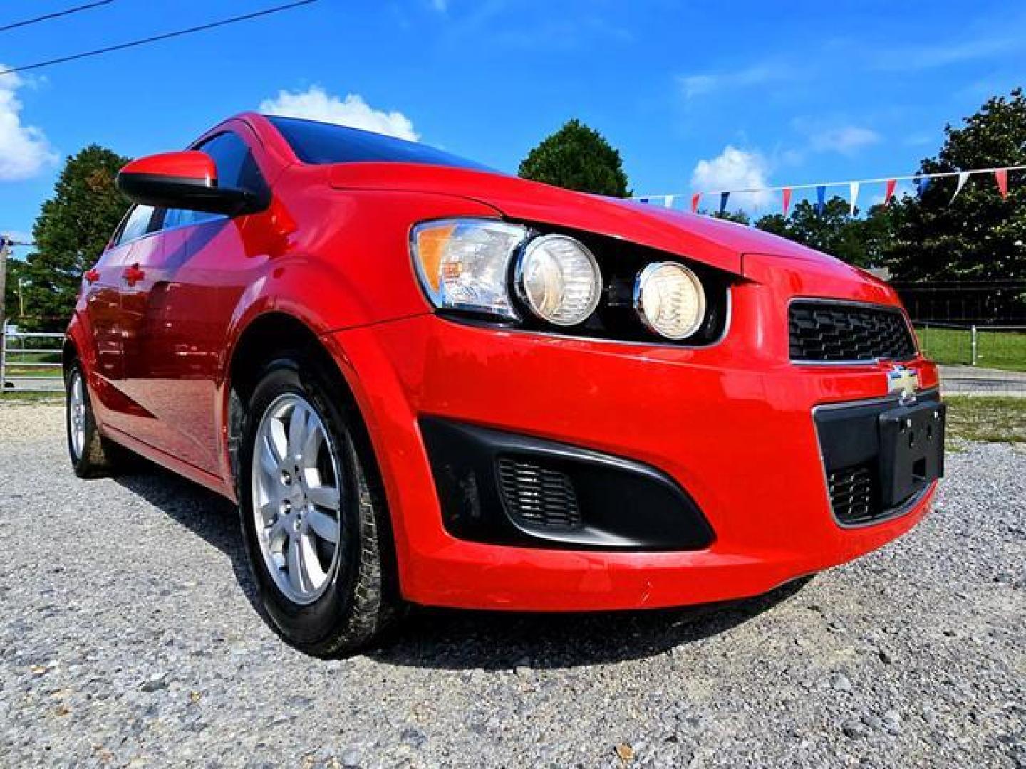 2012 Red /Grey Chevrolet Sonic LT Sedan 4D (1G1JC5SH7C4) , Automatic, 6-Spd transmission, located at 18001 Kellogg Rd, Saucier, MS, 39574, (228) 832-1441, 139.421463, -76.641457 - Photo#19