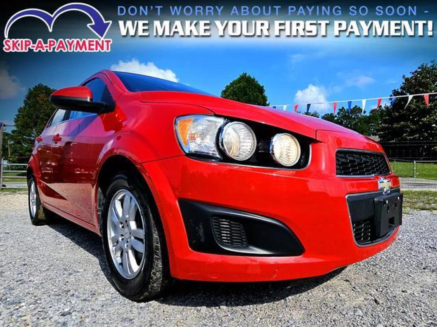 2012 Red /Grey Chevrolet Sonic LT Sedan 4D (1G1JC5SH7C4) , Automatic, 6-Spd transmission, located at 18001 Kellogg Rd, Saucier, MS, 39574, (228) 832-1441, 139.421463, -76.641457 - Photo#1